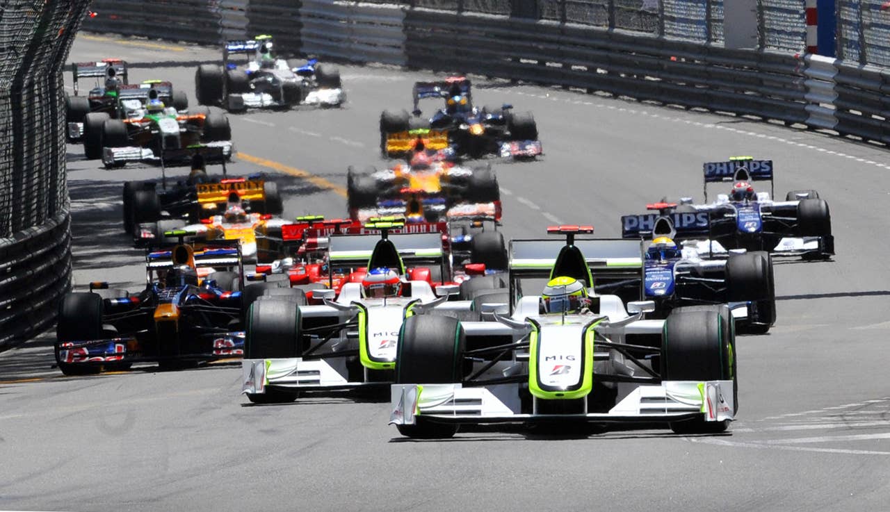 Brawn GP's British driver Jenson Button leads at the start of the Monaco racetrack on May 24, 2009 in Monte Carlo, during the Monaco Formula One Grand Prix. AFP PHOTO / GERARD JULIEN (Photo credit should read GERARD JULIEN/AFP/Getty Images)