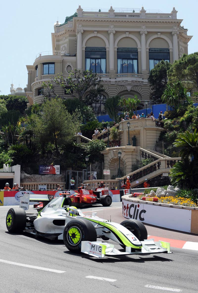 Brawn GP's British driver Jenson Button drives ahead of Ferrari Brazilian's driver Felipe Massa at the Monaco racetrack on May 24, 2009 in Monte Carlo, during the Monaco Formula One Grand Prix. Brawn GP's British driver Jenson Button won the race ahead his Brazilian team mate Rubens Barrichello and Ferrari's Finnish driver Kimi Raikkonen. AFP PHOTO / PASCAL GUYOT (Photo credit should read PASCAL GUYOT/AFP/Getty Images)