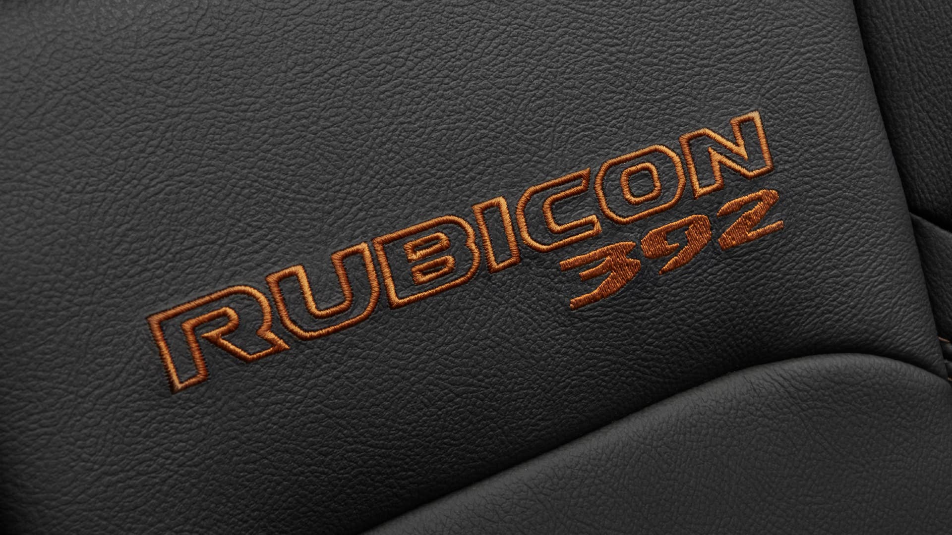 The Jeep® Wrangler Rubicon 392’s leather-appointed interior, with unique Bronze stitching, includes seats with performance-inspired, integrated upper bolsters to hold comfortably occupants in place.