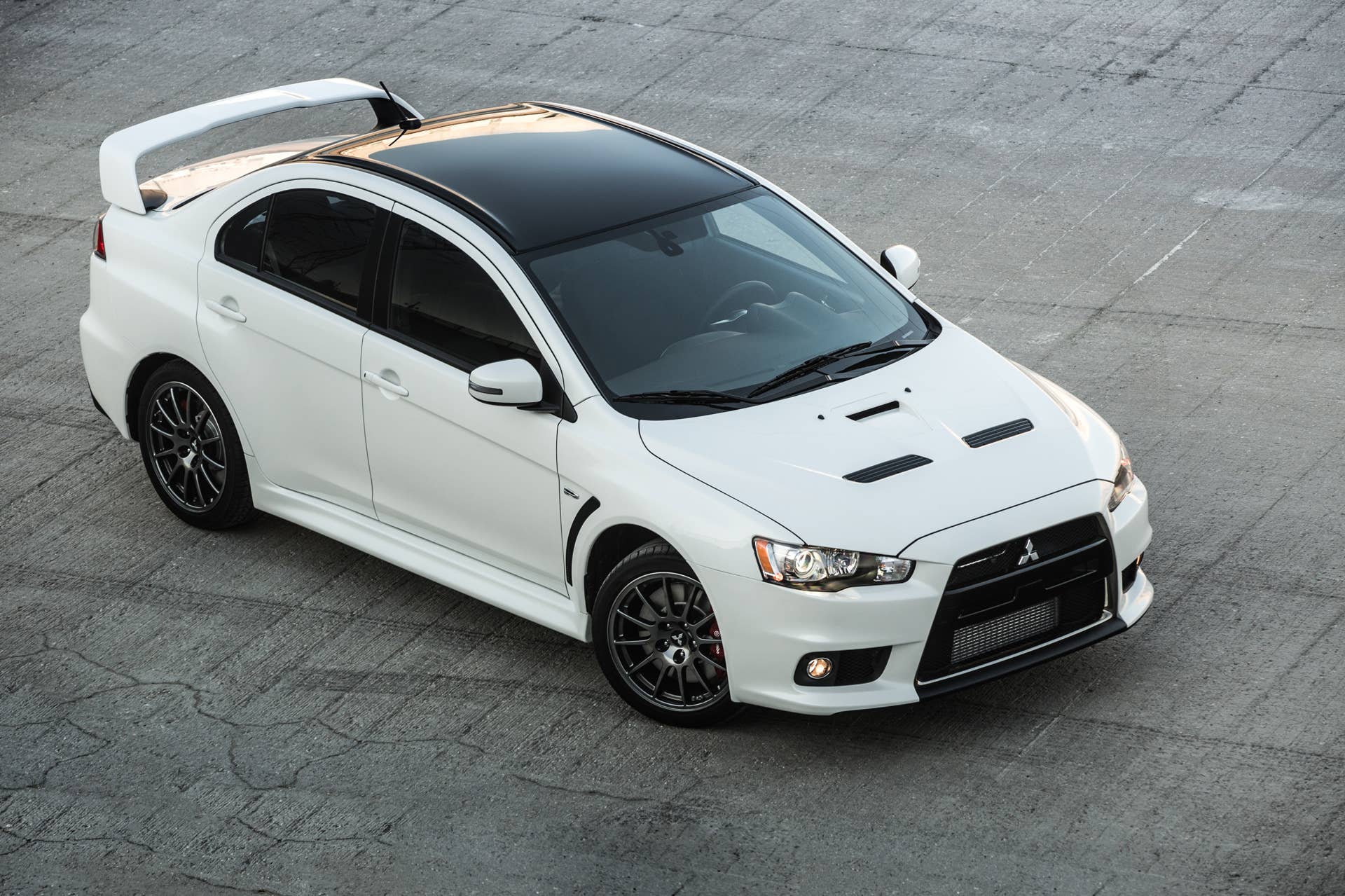 The 2015 Mitsubishi Lancer Evolution Final Edition, overhead front three-quarter.