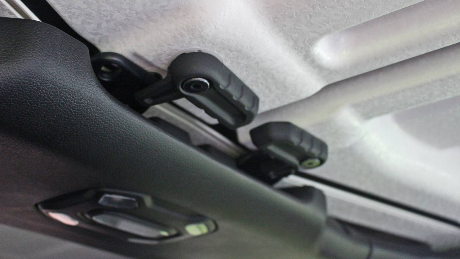 2020 Jeep Gladiator Rubicon hard top front panel retention tabs.