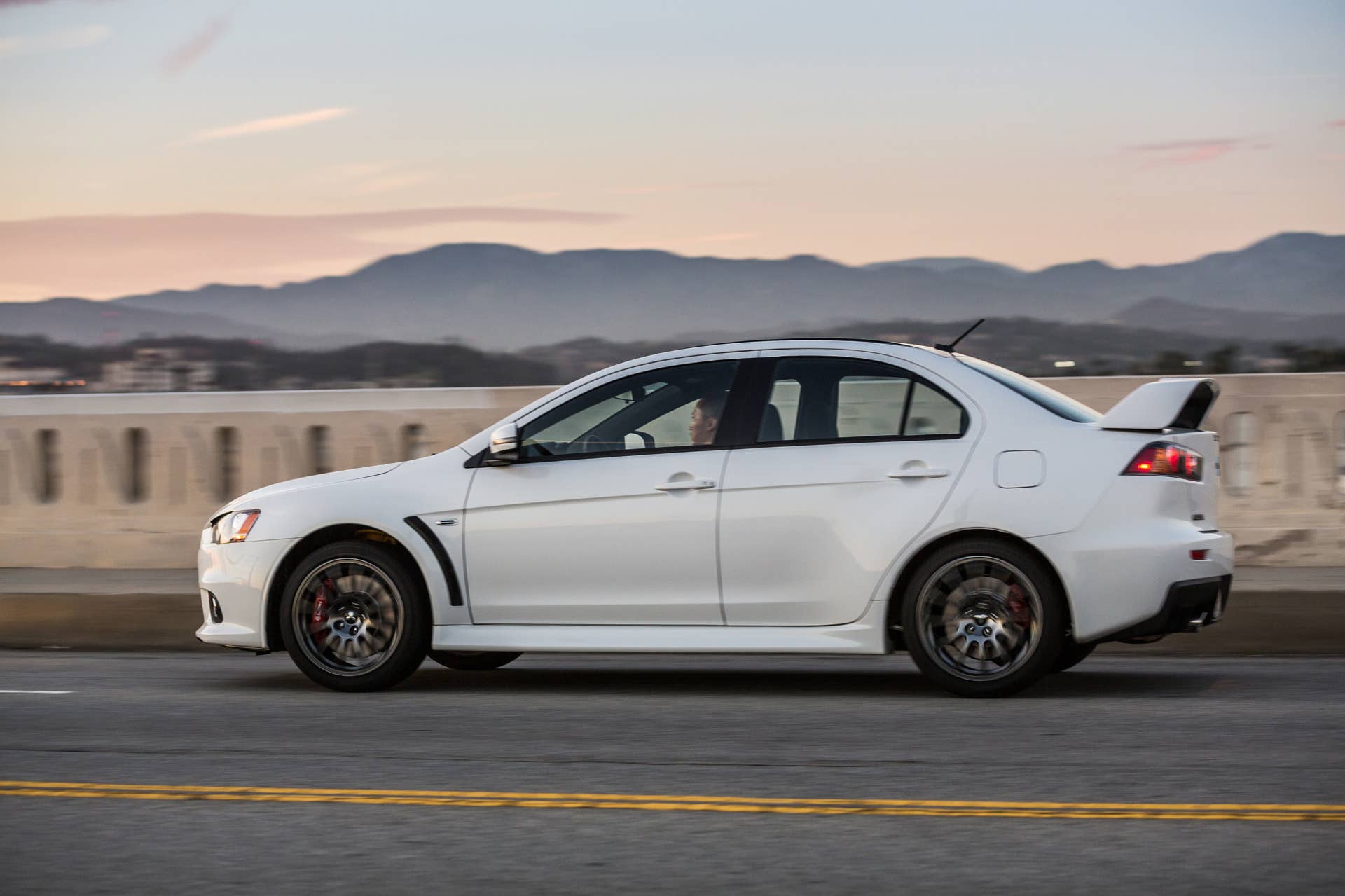 The 2015 Mitsubishi Lancer Evolution Final Edition, side view.