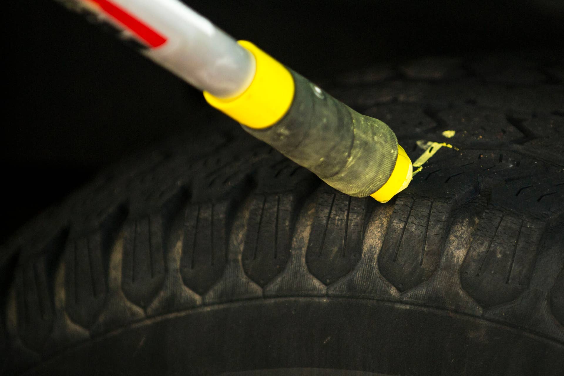 ARVADA, CO - AUGUST 09: Arvada Traffic Enforcement Officer R.J. Everett chalks tires while walking the streets of Historic Old Town Arvada, enforcing parking regulations, on Saturday, August 09, 2014 in Arvada, Colorado. In recent months the City has begun enforcing parking restrictions downtown, in the wake of closing a parking lot to make way for a new 650-car garage for the light rail station. (Photo by Kent Nishimura/The Denver Post via Getty Images)