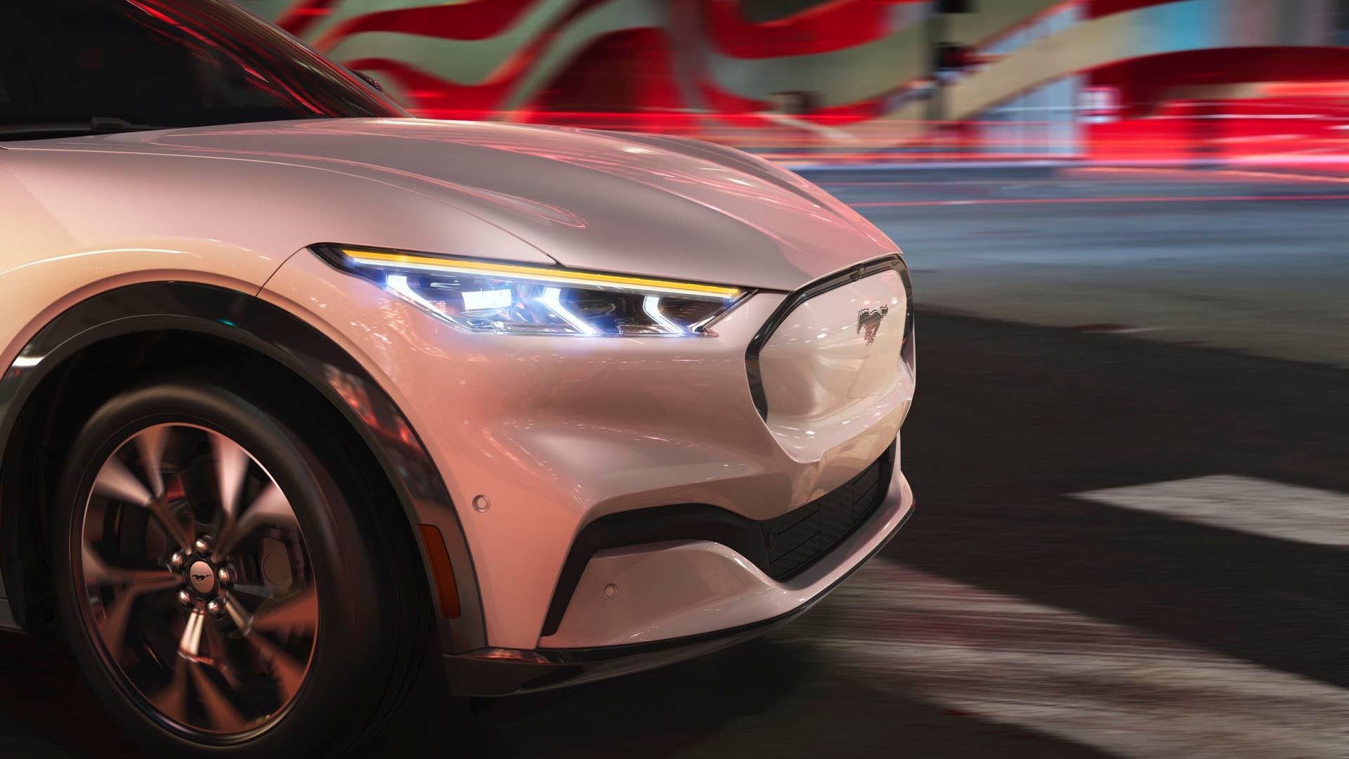 By moving the vehicle's front wheelbase forward, Ford was able to give Mustang Mach-E the space needed to design its signature hood and aggressive headlights.