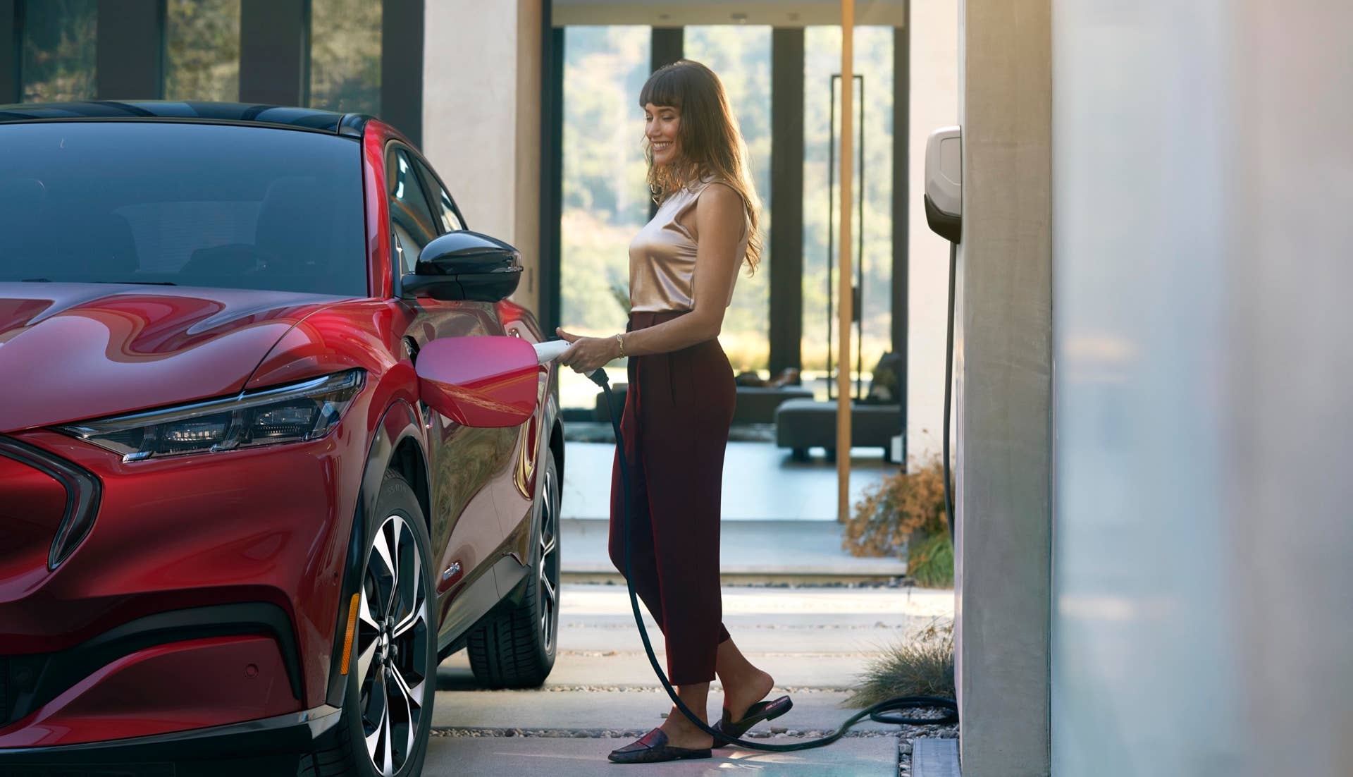 Electric vehicle owners do 80 percent of their charging at home, and Ford is offering a Ford Connected Charge Station that will be able to add an estimated average range of 32 miles per charging hour with a 240V outlet to the Mustang Mach-E RWD with extended range battery.