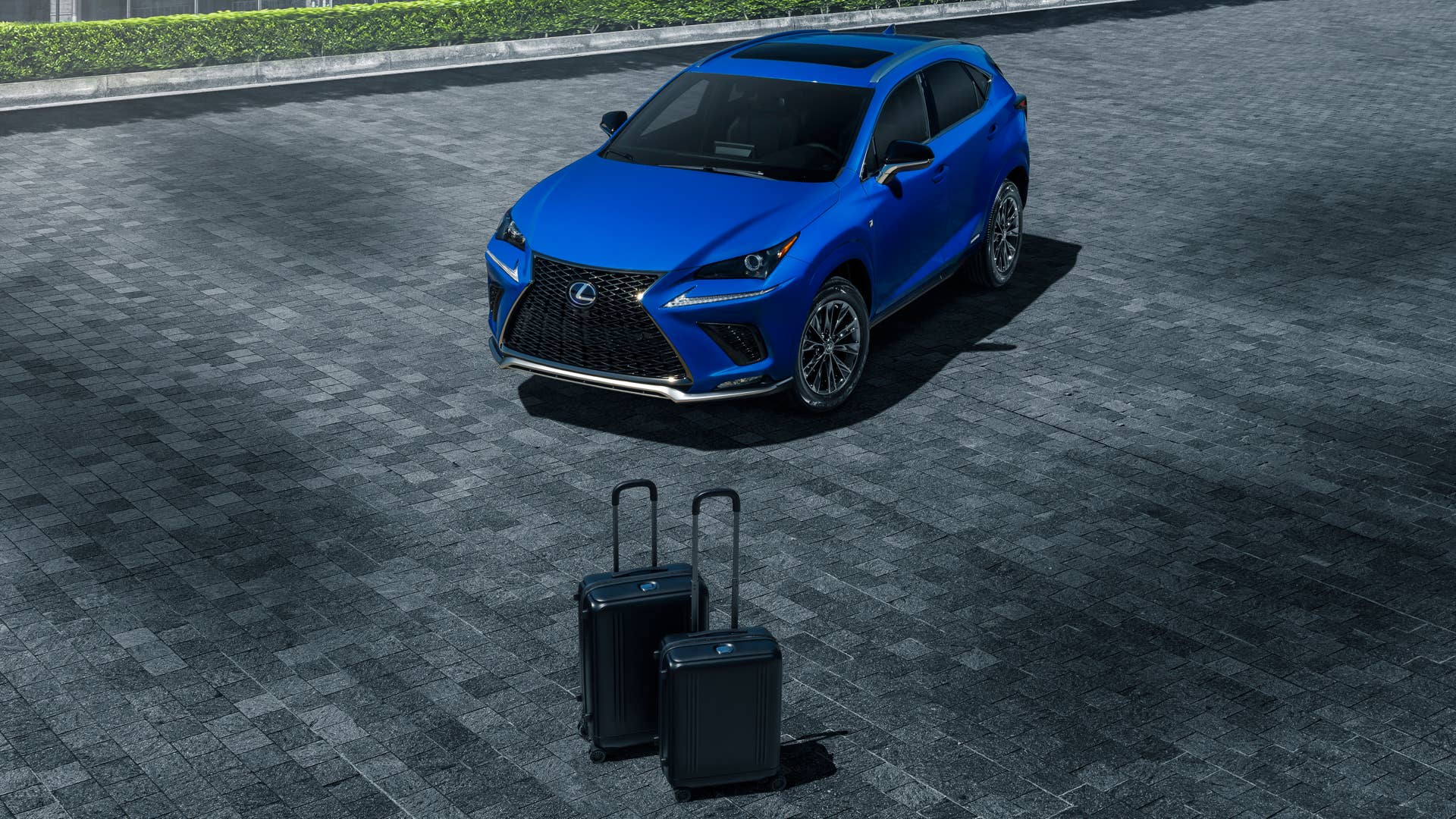 Lexus combines its Black Line Special Edition features with a new Grecian Blue color on the NX 300h F Sport, and a pair of Zero Halliburton travel cases.