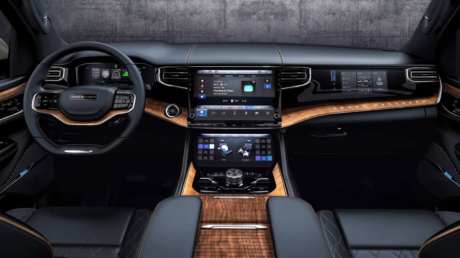 All-new 2022 Grand Wagoneer features the pinnacle of premium SUV interiors (seen here in Blue Agave with wood accents) with a modern American style and Uconnect 5 12-inch touchscreen radio.