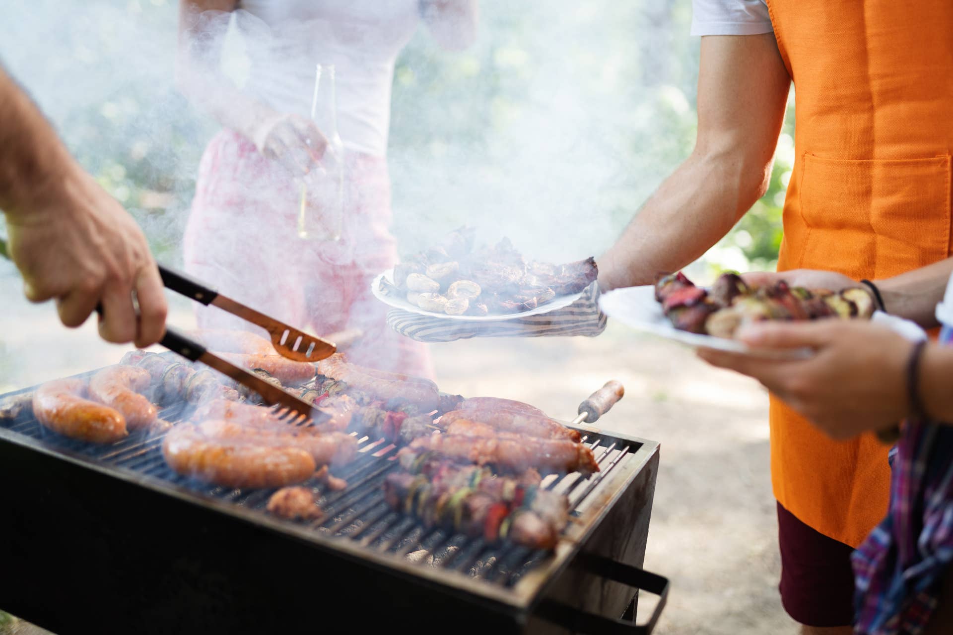 Delicious meat and sausages on the barbecue grill