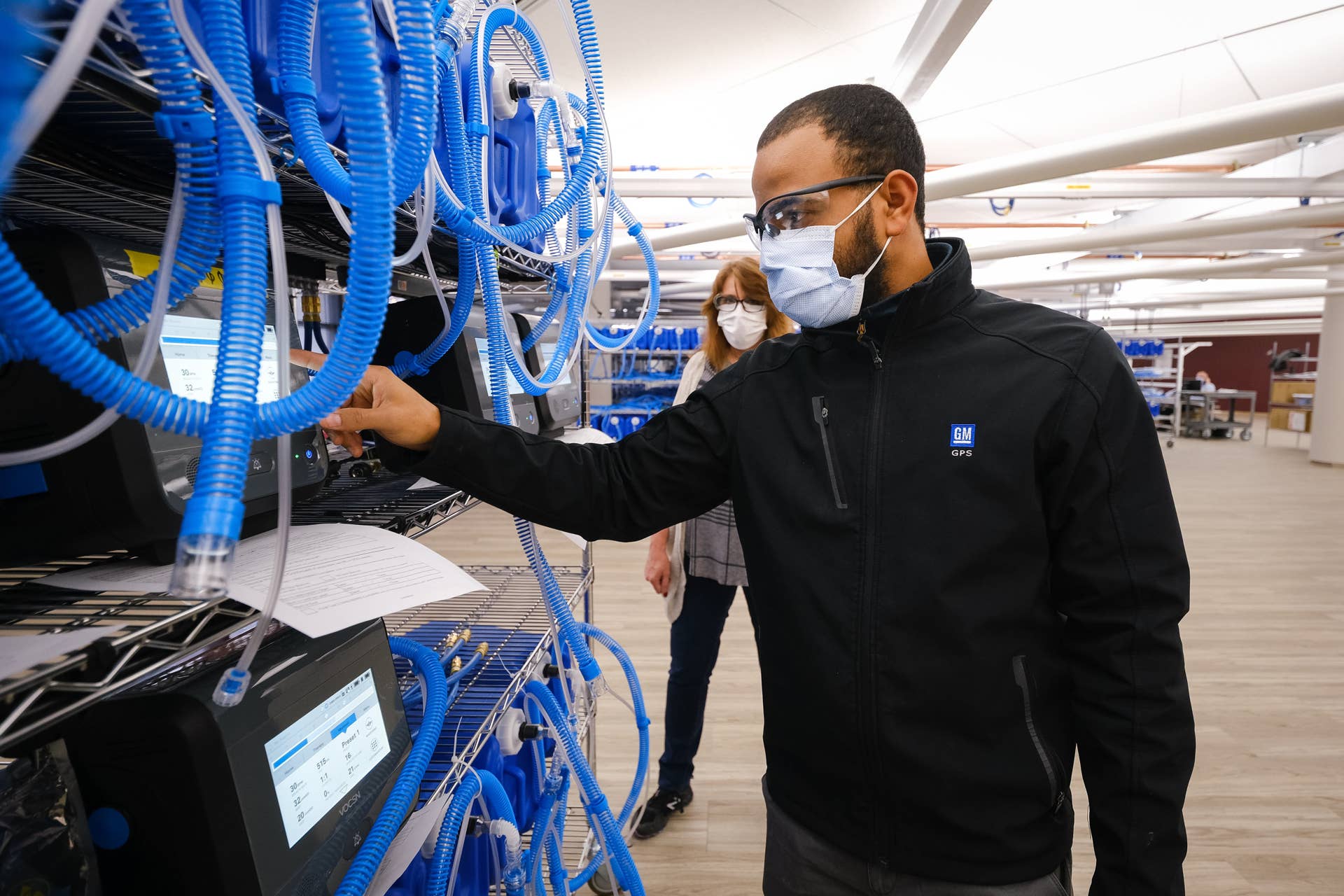Workers build the first production ventilators at the General Motors manufacturing facility in Kokomo, Indiana, Tuesday, April 14, 2020. GM and Ventec Life Systems are partnering to produce Ventec critical care ventilators in response to the COVID-19 pandemic. (Photo by AJ Mast for General Motors)