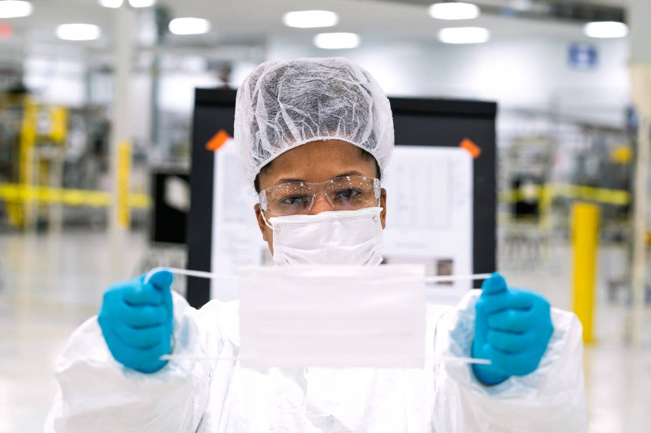Workers begin final preparation for manufacturing Level 1 face masks Wednesday, April 1, 2019 at the General Motors facility in Warren, Michigan. (Photo by John F. Martin for General Motors)