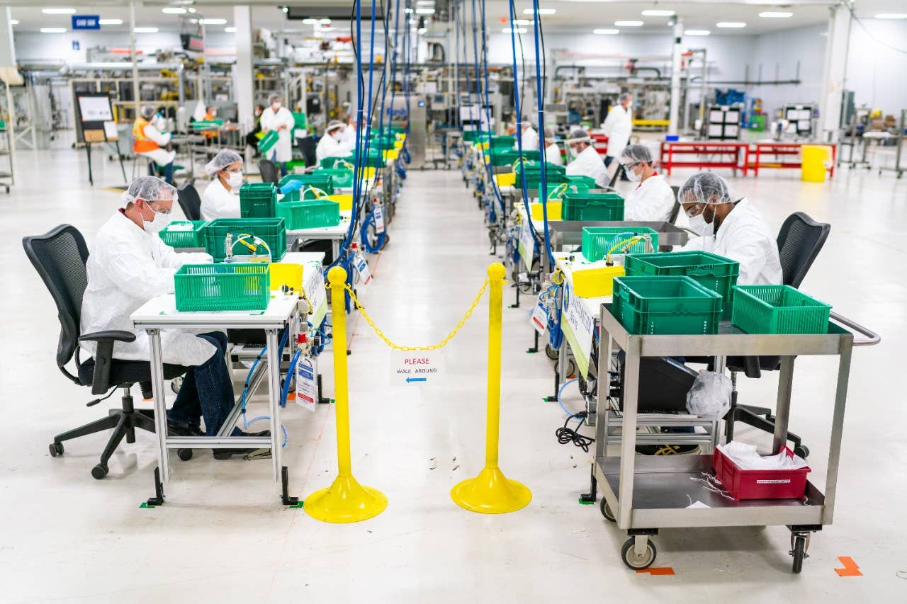 Workers begin final preparation for manufacturing Level 1 face masks Wednesday, April 1, 2019 at the General Motors facility in Warren, Michigan. (Photo by John F. Martin for General Motors)