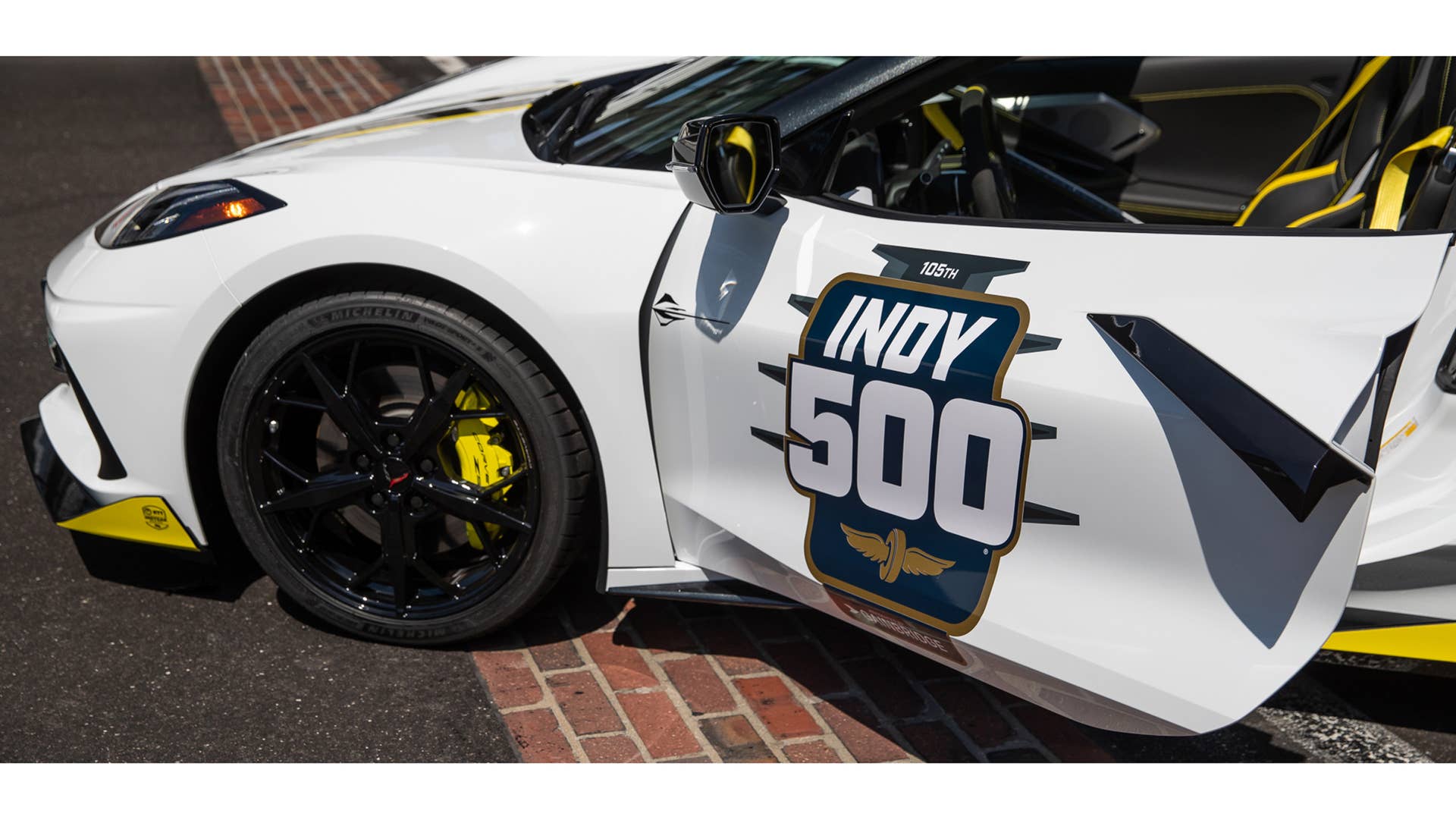 May 11, 2021; Indianapolis, IN, USA; The Indianapolis 500 pace car, a 2021 mid-engine Chevrolet Corvette Stingray hardtop convertible, is revealed Tuesday, May 11, 2021, on the Yard of Bricks at Indianapolis Motor Speedway. The arctic-white Stingray will be the first convertible to serve in the role in more than a decade. Mandatory Credit: Mykal McEldowney-USA TODAY Sports