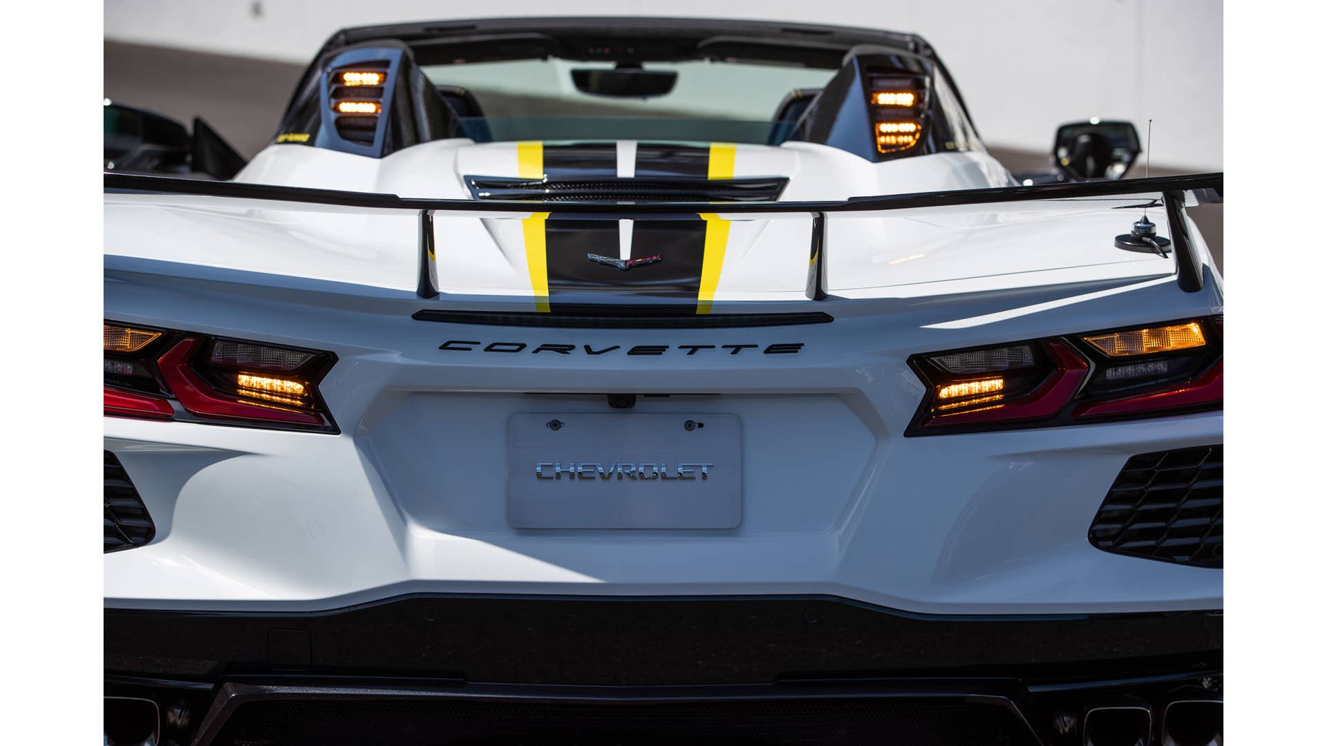 May 11, 2021; Indianapolis, IN, USA; The Indianapolis 500 pace car, a 2021 mid-engine Chevrolet Corvette Stingray hardtop convertible, is revealed Tuesday, May 11, 2021, on the Yard of Bricks at Indianapolis Motor Speedway. The arctic-white Stingray will be the first convertible to serve in the role in more than a decade. Mandatory Credit: Mykal McEldowney-USA TODAY Sports