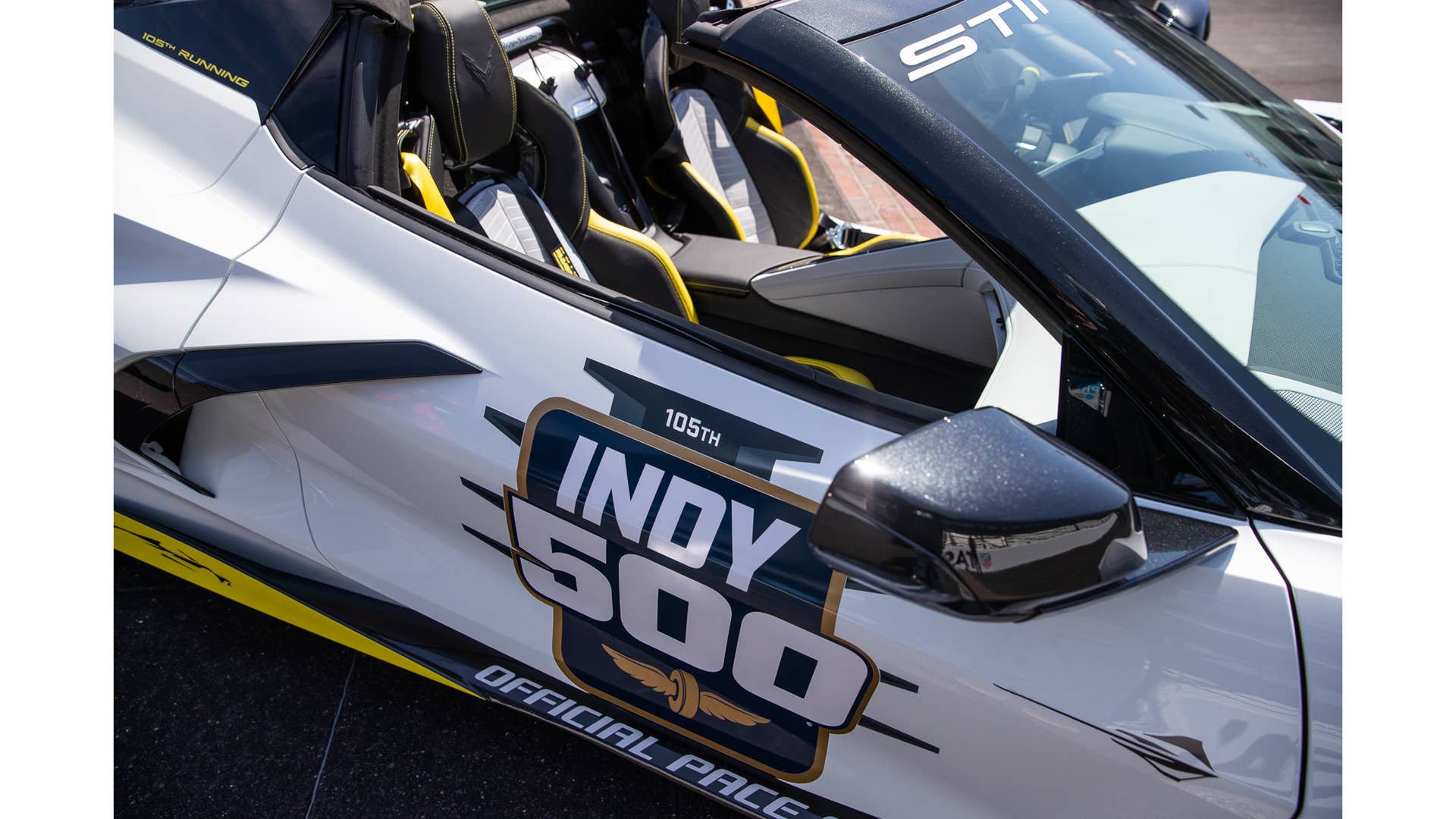 May 11, 2021; Indianapolis, IN, USA; The Indianapolis 500 pace car, a 2021 mid-engine Chevrolet Corvette Stingray hardtop convertible, is revealed Tuesday, May 11, 2021, on the Yard of Bricks at Indianapolis Motor Speedway. The arctic-white Stingray will be the first convertible to serve in the role in more than a decade. Mandatory Credit: Mykal McEldowney-USA TODAY Sports