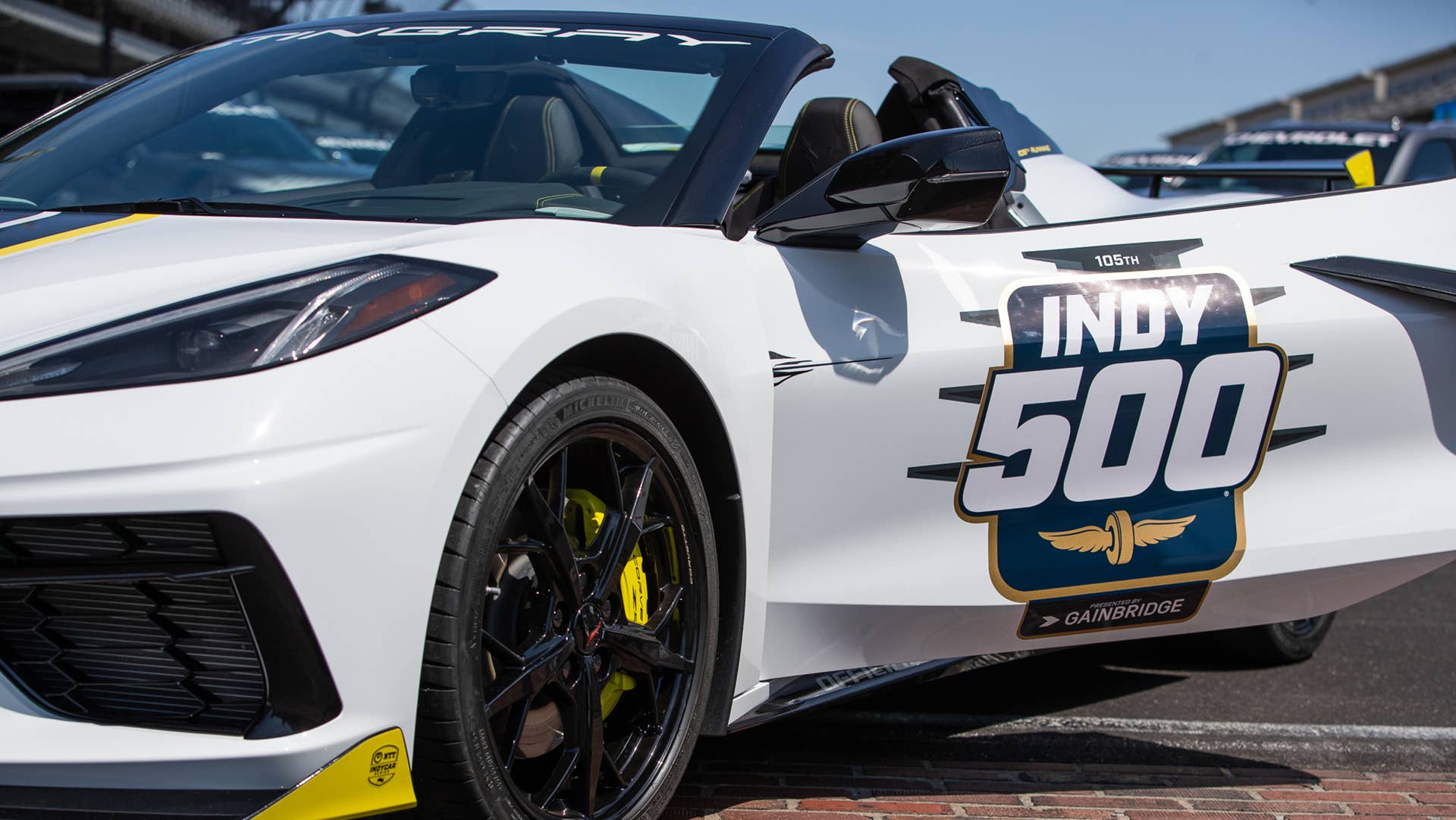 May 11, 2021; Indianapolis, IN, USA; The Indianapolis 500 pace car, a 2021 mid-engine Chevrolet Corvette Stingray hardtop convertible, is revealed Tuesday, May 11, 2021, on the Yard of Bricks at Indianapolis Motor Speedway. The arctic-white Stingray will be the first convertible to serve in the role in more than a decade. Mandatory Credit: Mykal McEldowney-USA TODAY Sports