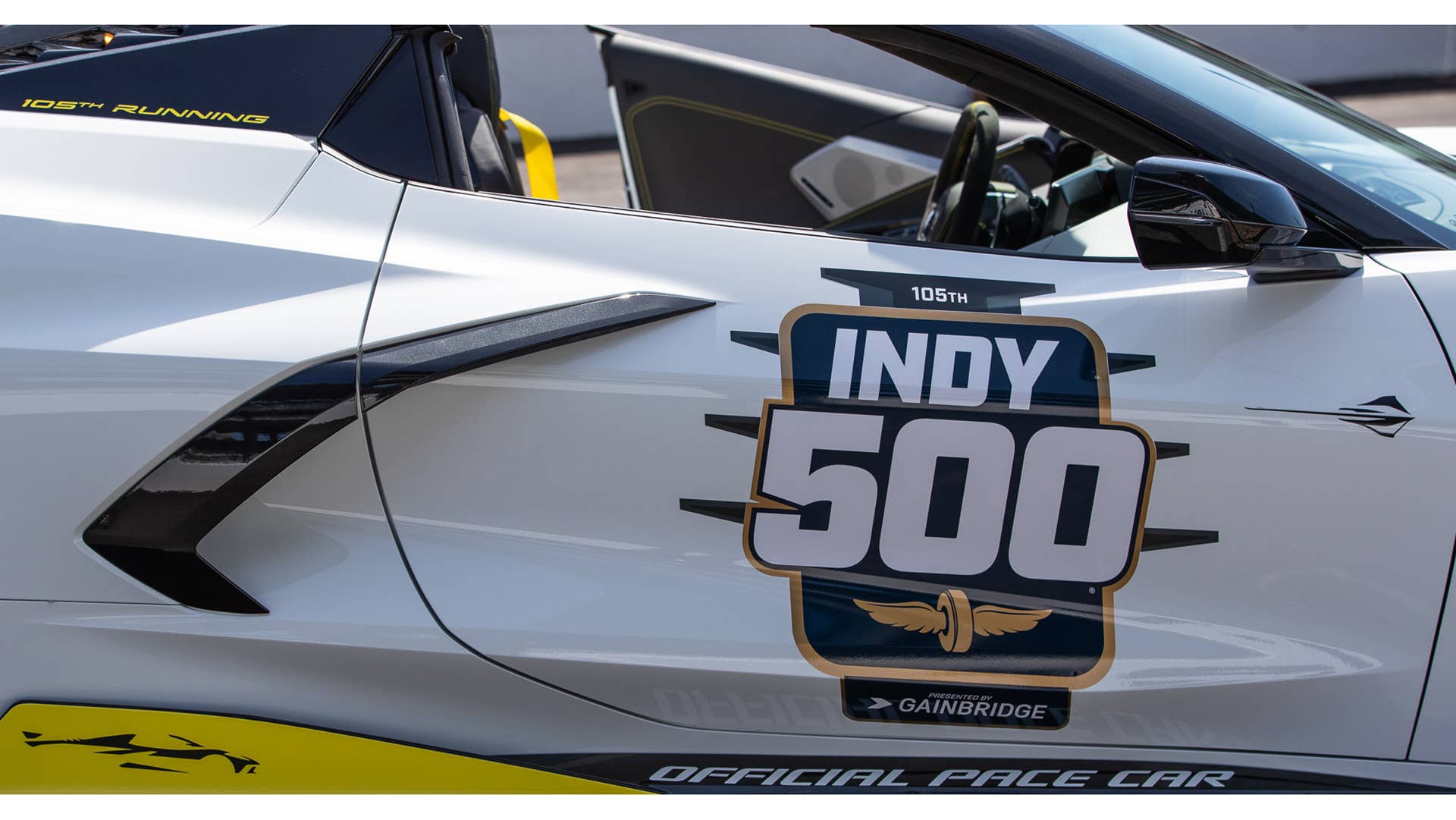 May 11, 2021; Indianapolis, IN, USA; The Indianapolis 500 pace car, a 2021 mid-engine Chevrolet Corvette Stingray hardtop convertible, is revealed Tuesday, May 11, 2021, on the Yard of Bricks at Indianapolis Motor Speedway. The arctic-white Stingray will be the first convertible to serve in the role in more than a decade. Mandatory Credit: Mykal McEldowney-USA TODAY Sports