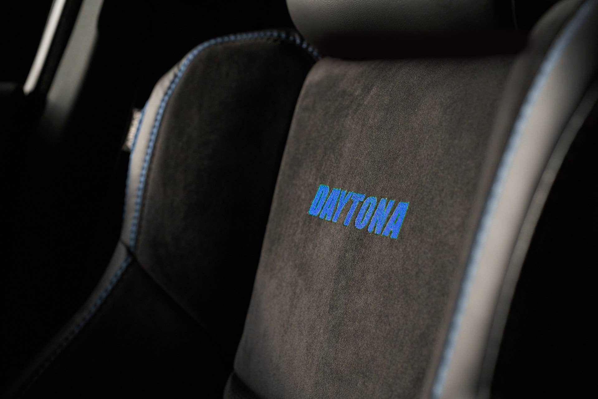 Daytona cues are seamlessly integrated into the interior with unique black heated and ventilated Nappa leather and Alcantara suede performance seats with blue accent stitching and “Daytona” embroidered seat backs.