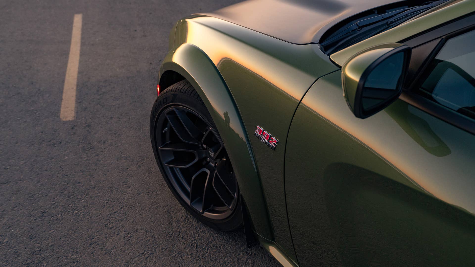 The 2020 Dodge Charger Scat Pack Widebody features an optional 20-inch by 11-inch Carbon Black wheel