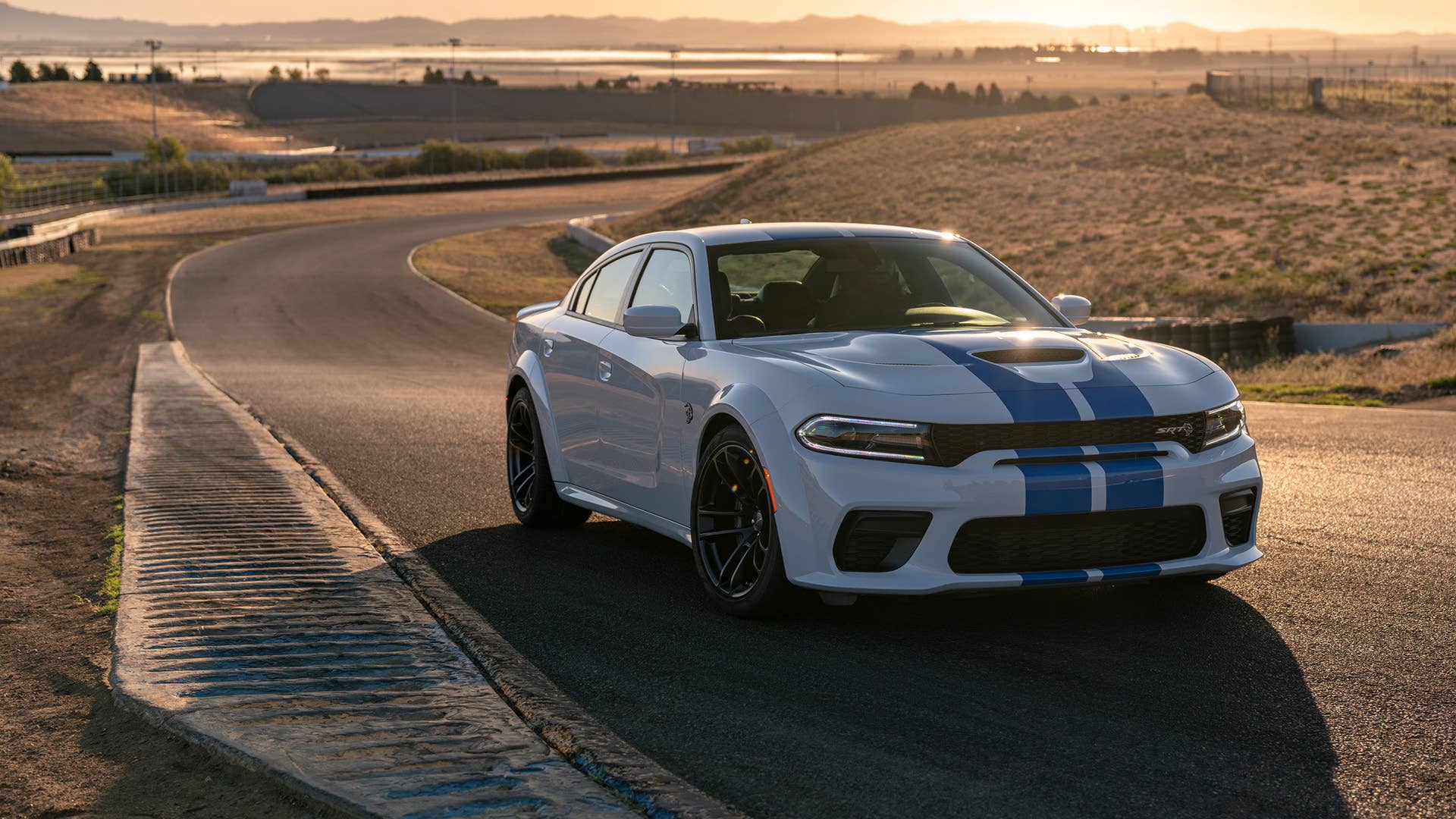 The 2020 Dodge Charger SRT Hellcat Widebody is powered by the proven supercharged 6.2-liter HEMI® Hellcat V-8 engine, which delivers a best-in-class 707 horsepower and 650 lb.-ft. of torque.
