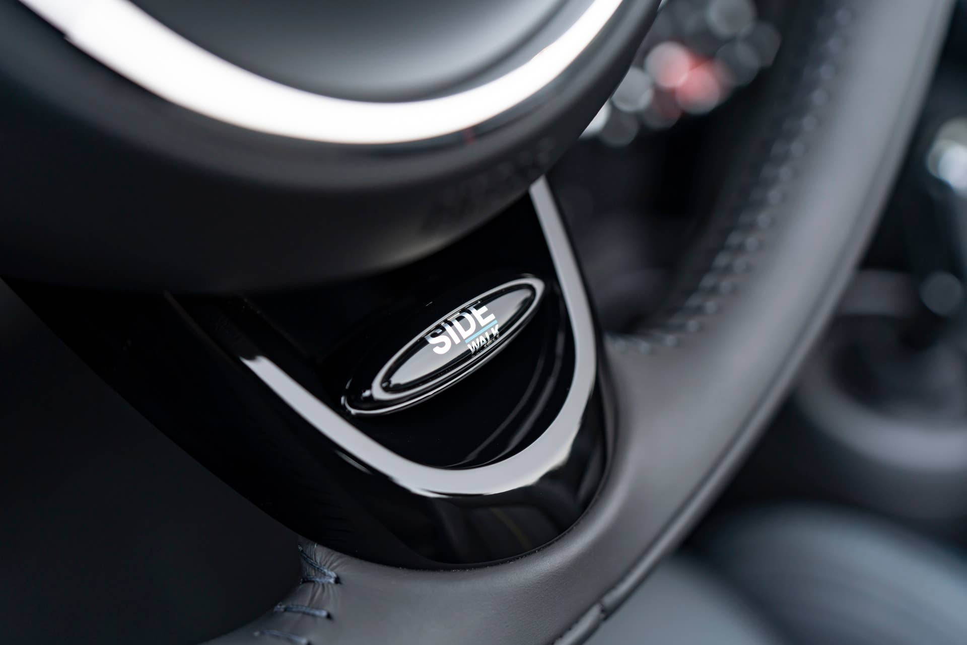 Resurrecting a name for an appearance package from 2007, the Mini Convertible Sidewalk pairs exclusive Deep Laguna Metallic with special wheels and Mini Yours interior options.