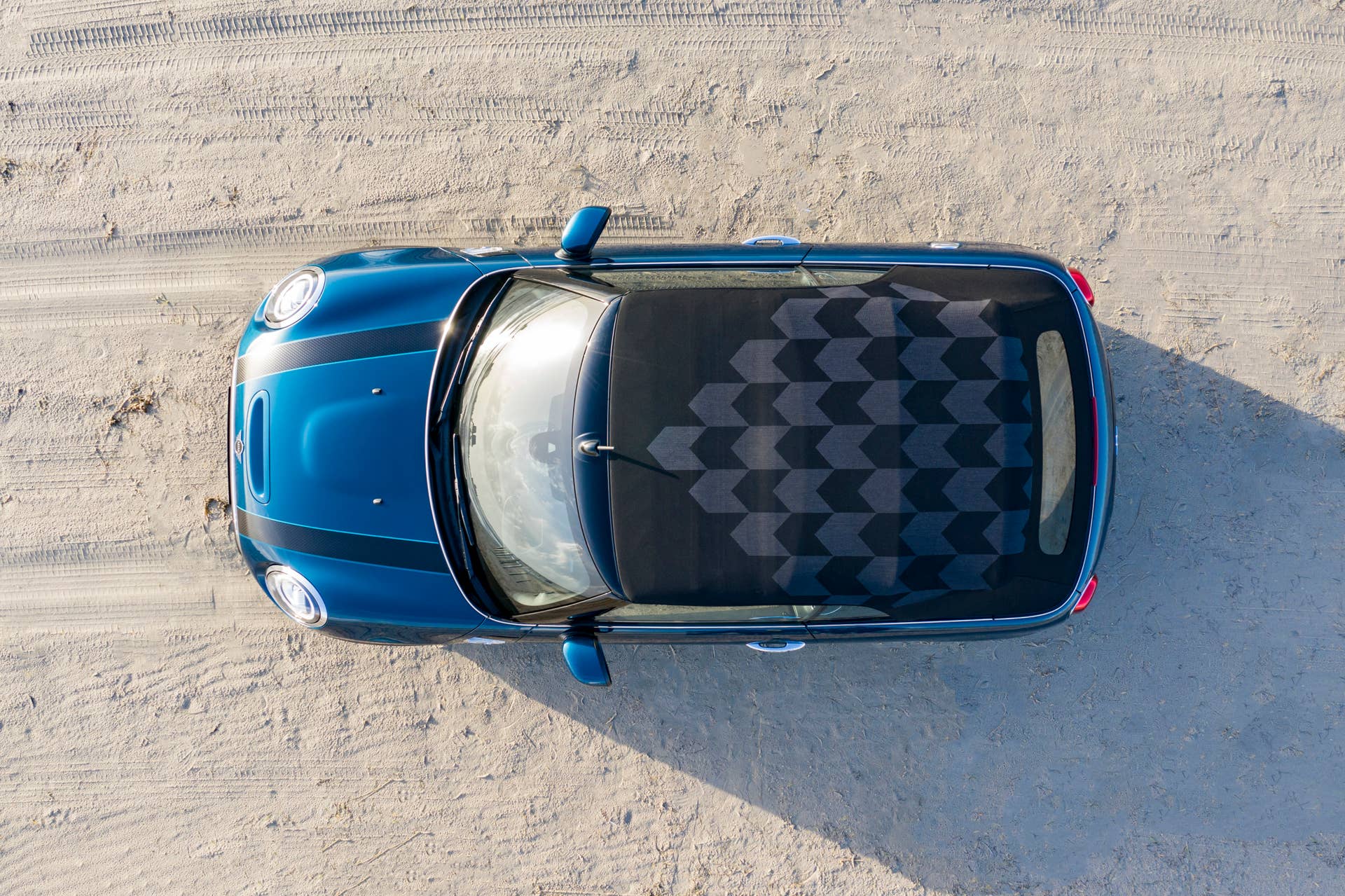Resurrecting a name for an appearance package from 2007, the Mini Convertible Sidewalk pairs exclusive Deep Laguna Metallic with special wheels and Mini Yours interior options.