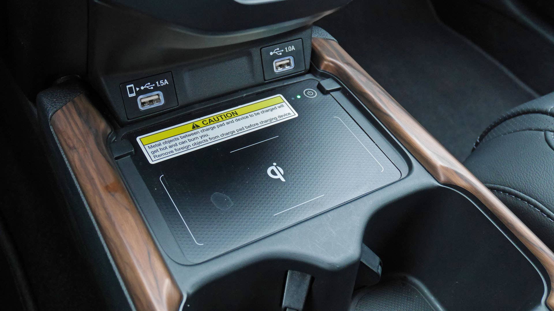 Wireless charger, standard and available only on Touring trim