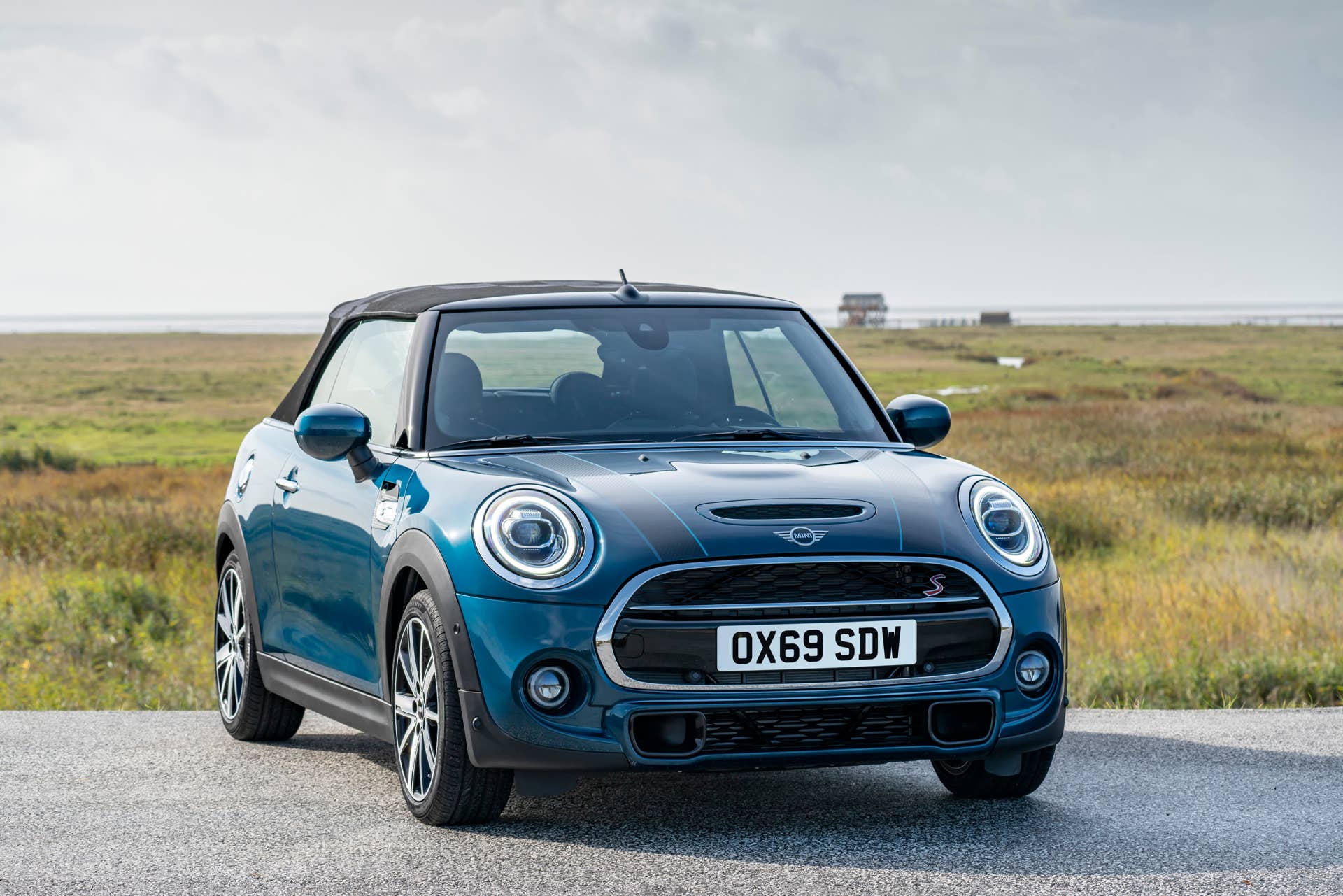 Resurrecting a name for an appearance package from 2007, the Mini Convertible Sidewalk pairs exclusive Deep Laguna Metallic with special wheels and Mini Yours interior options.