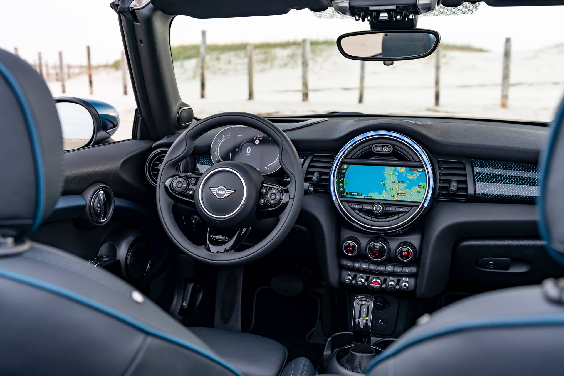 Resurrecting a name for an appearance package from 2007, the Mini Convertible Sidewalk pairs exclusive Deep Laguna Metallic with special wheels and Mini Yours interior options.