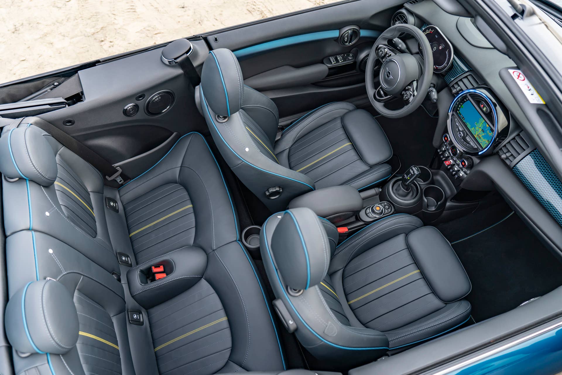 Resurrecting a name for an appearance package from 2007, the Mini Convertible Sidewalk pairs exclusive Deep Laguna Metallic with special wheels and Mini Yours interior options.