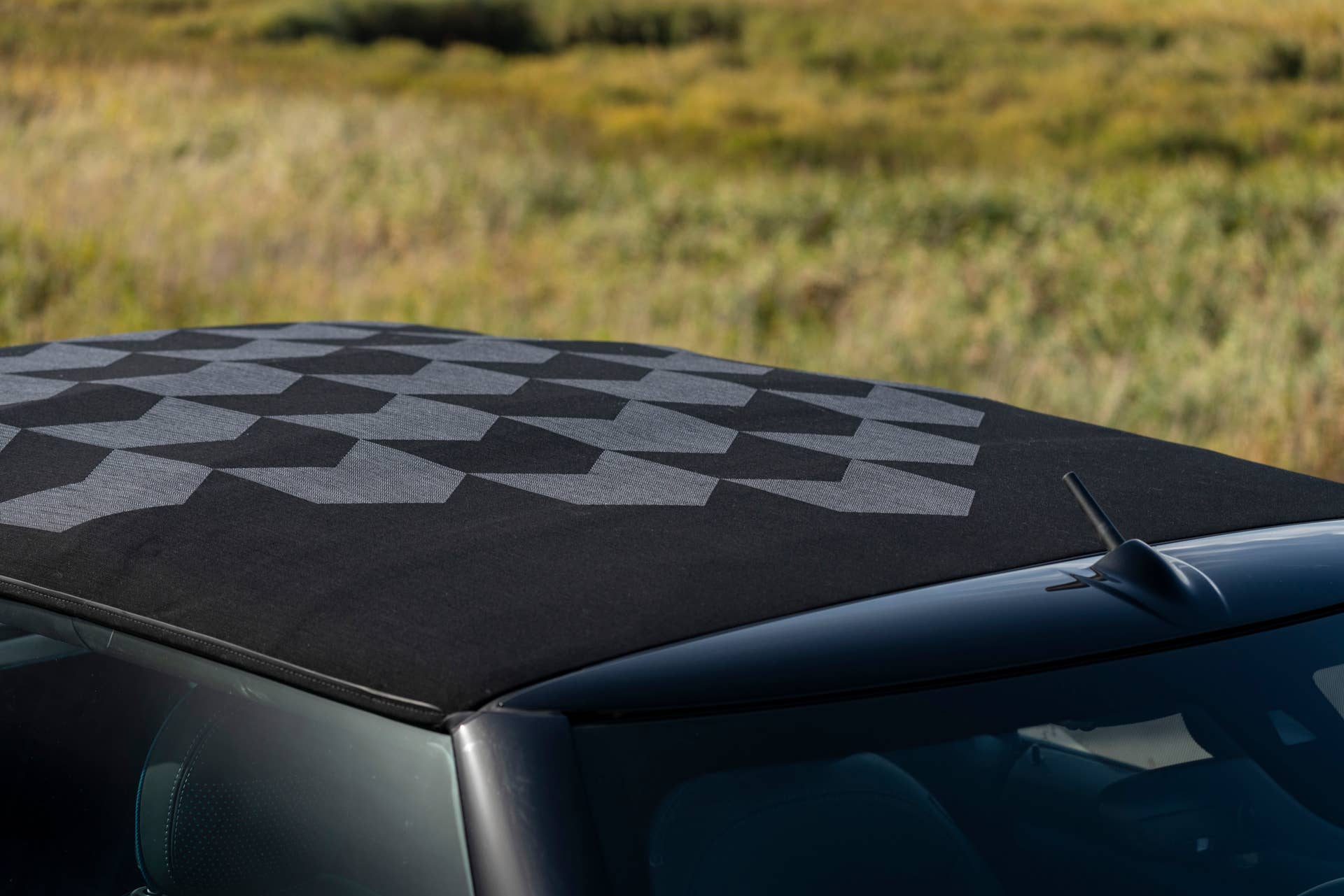 Resurrecting a name for an appearance package from 2007, the Mini Convertible Sidewalk pairs exclusive Deep Laguna Metallic with special wheels and Mini Yours interior options.