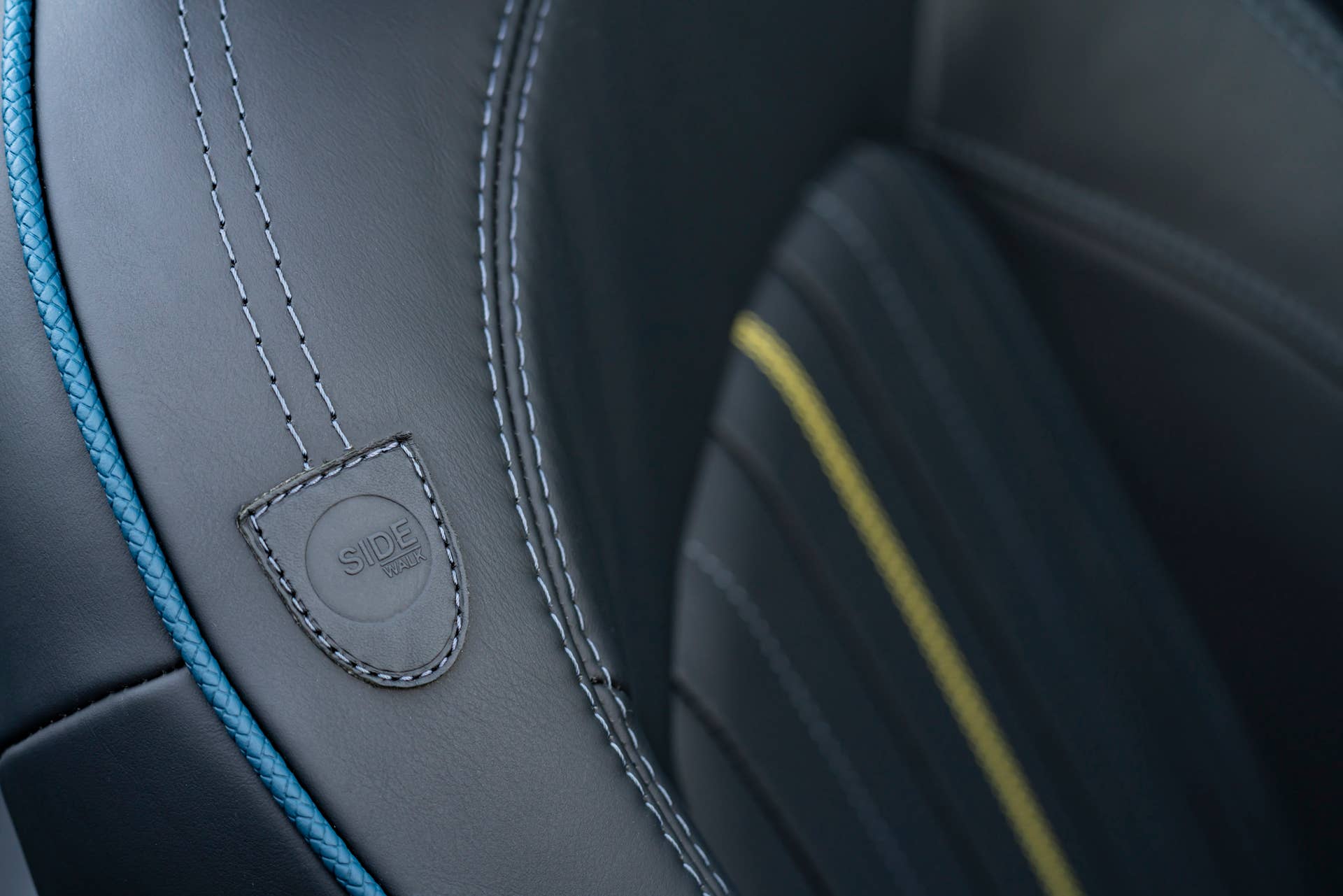 Resurrecting a name for an appearance package from 2007, the Mini Convertible Sidewalk pairs exclusive Deep Laguna Metallic with special wheels and Mini Yours interior options.