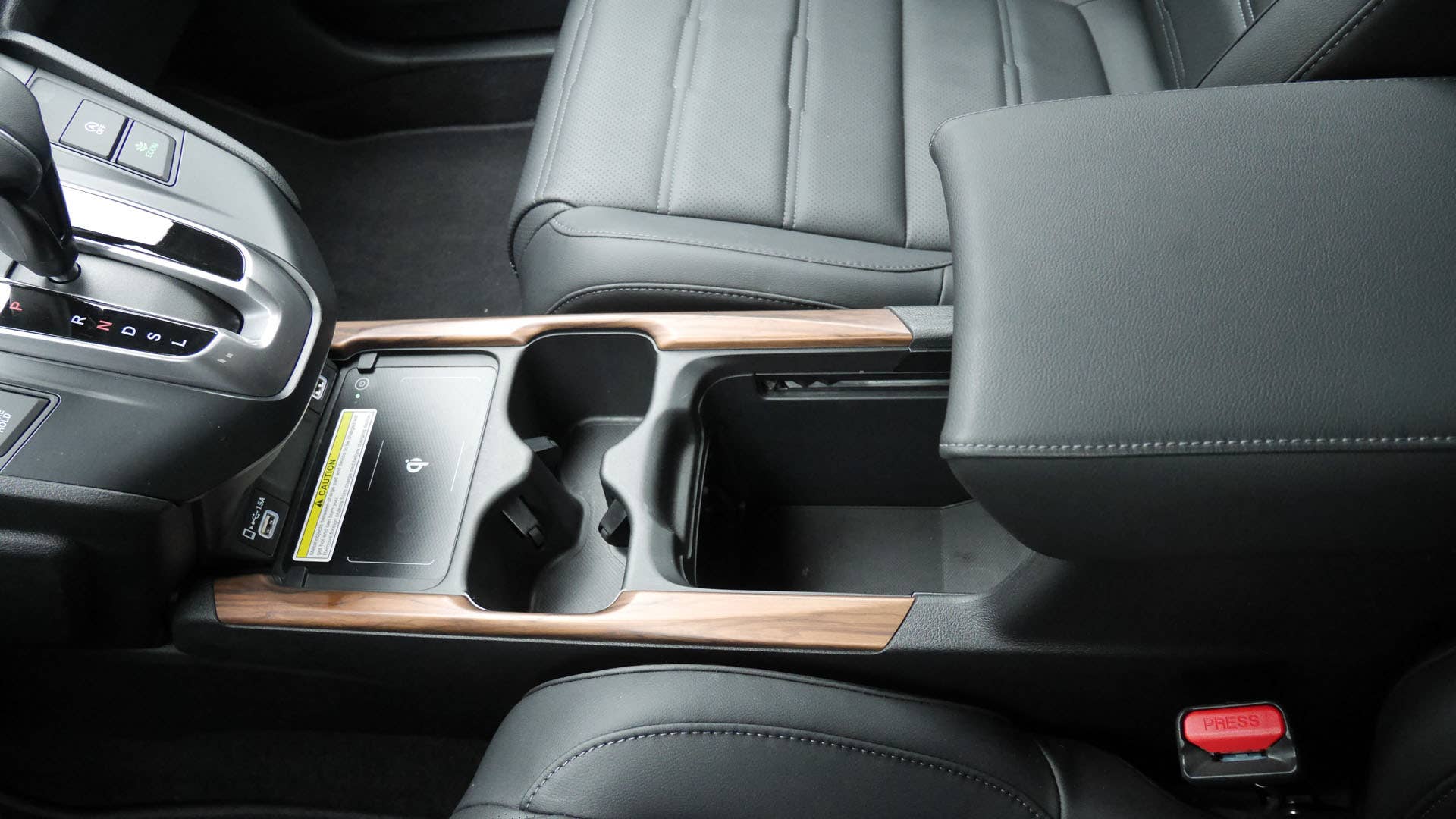 Many-ways adjustable center console bin