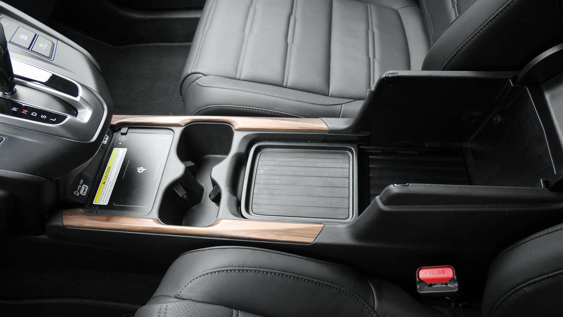 Many-ways adjustable center console bin