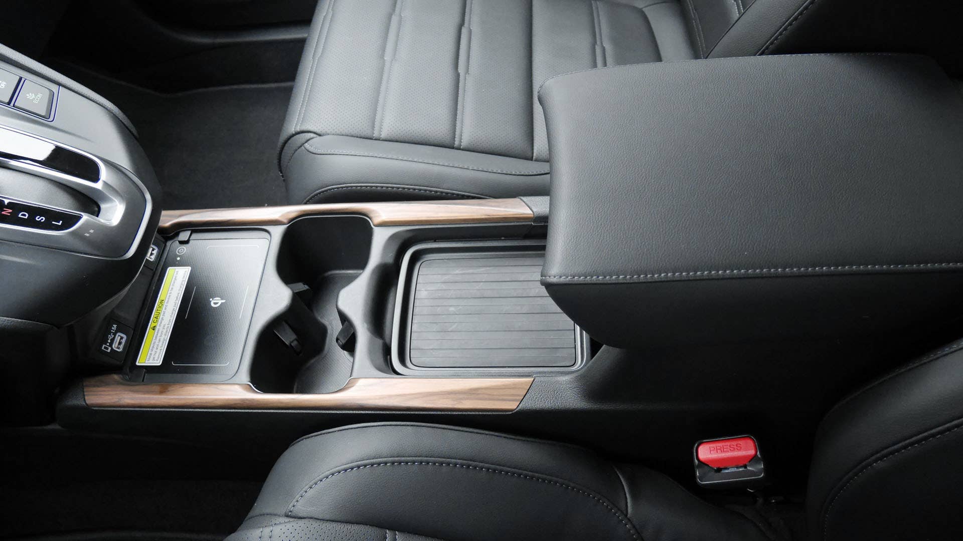 Many-ways adjustable center console bin