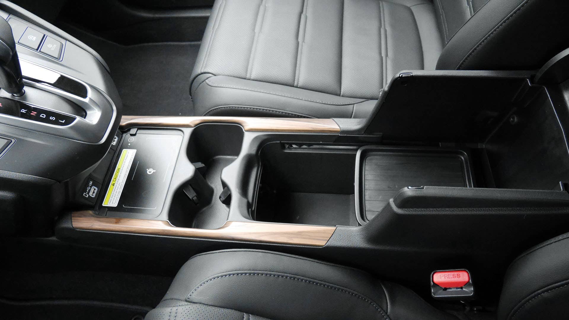 Many-ways adjustable center console bin
