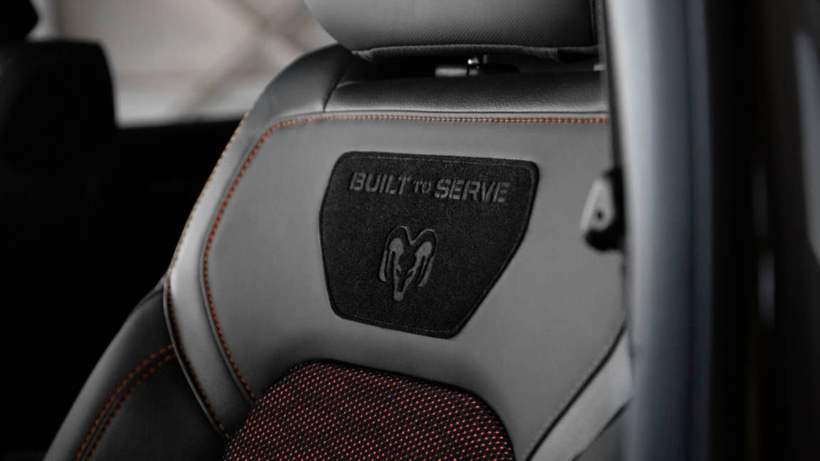 2021 Ram 1500 Built to Serve Edition features orange accents, and standard content encourages owner customization.
