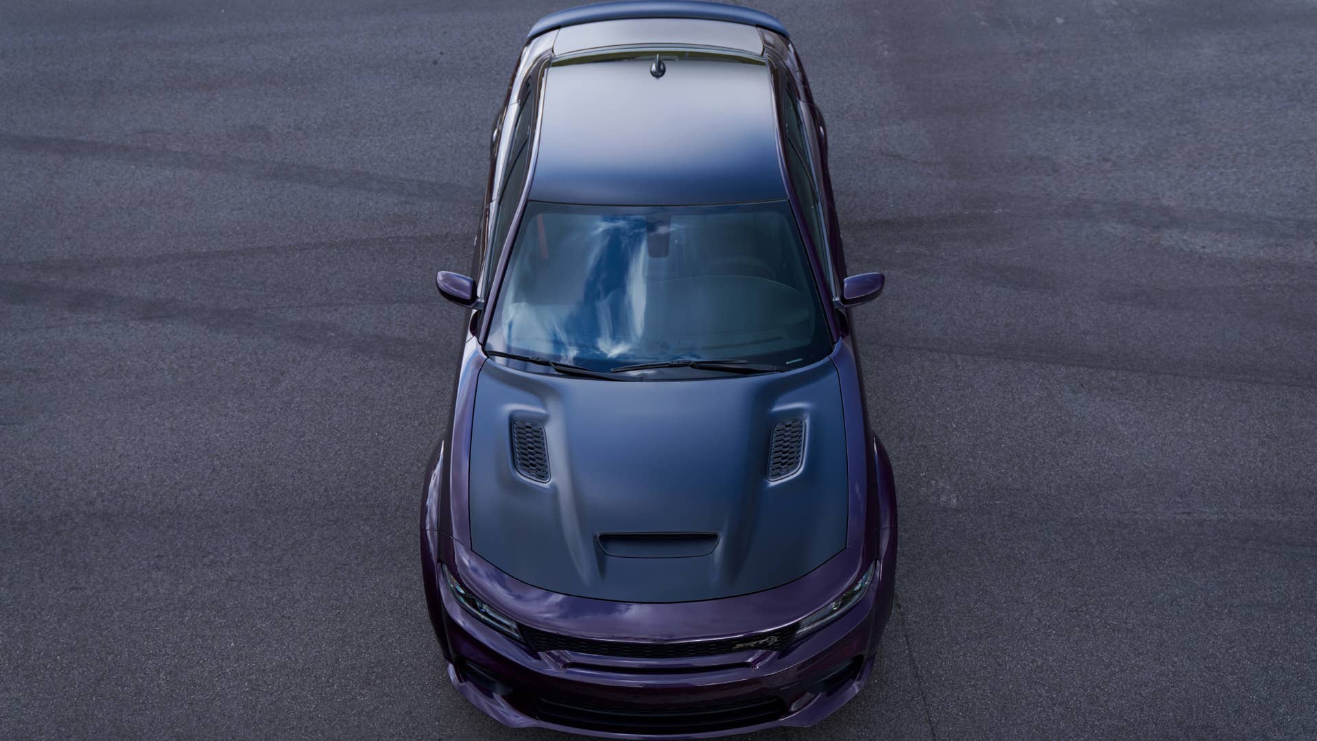 2021 Dodge Charger SRT Hellcat Redeye: Beyond its menacing stance, the newly designed performance hood on the Charger SRT Hellcat Redeye looks even more sinister and provides maximum air intake to the supercharged power plant from the functional hood scoop to boost power.