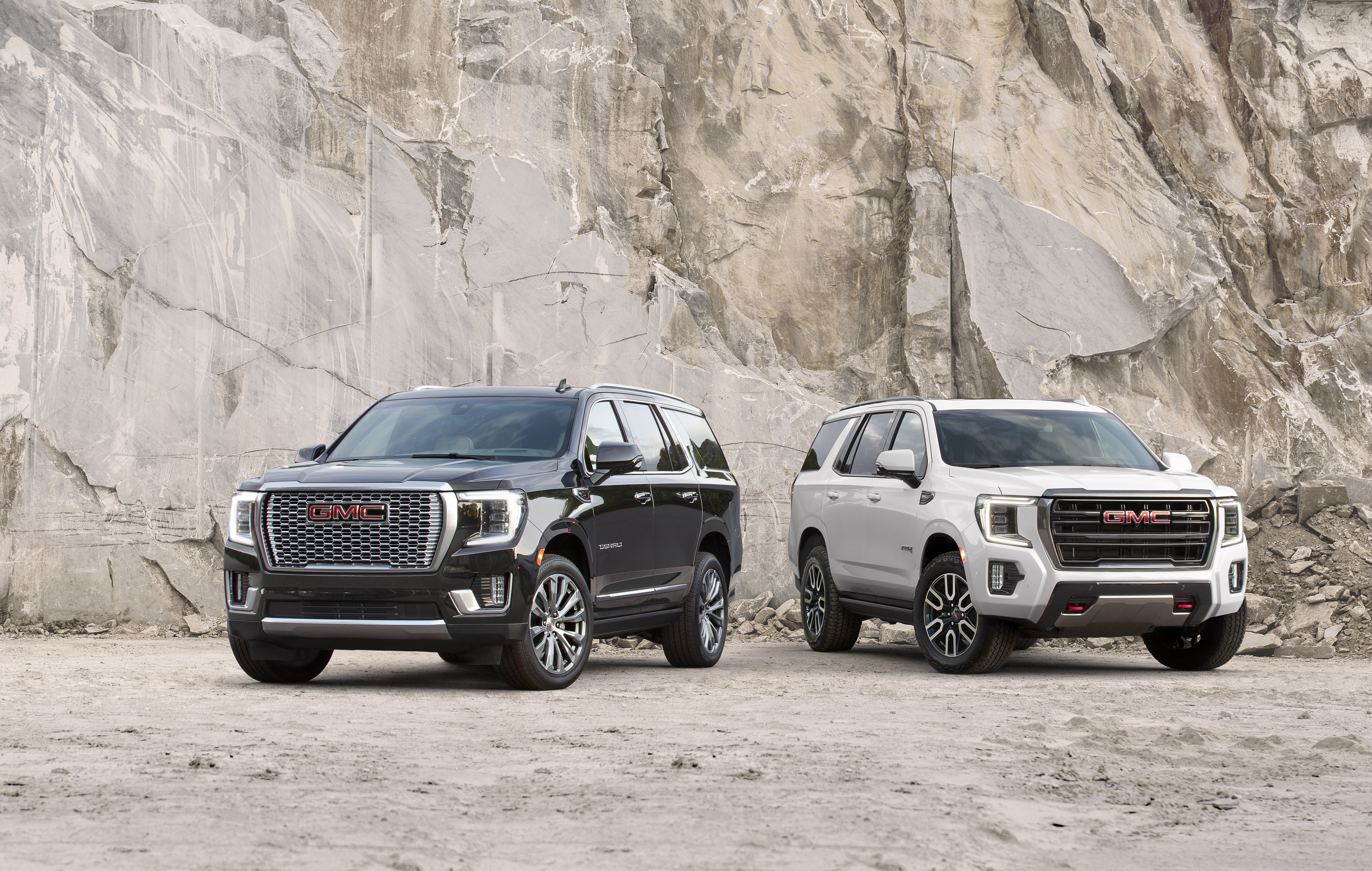 (L to R) 2021 GMC Yukon Denali and AT4