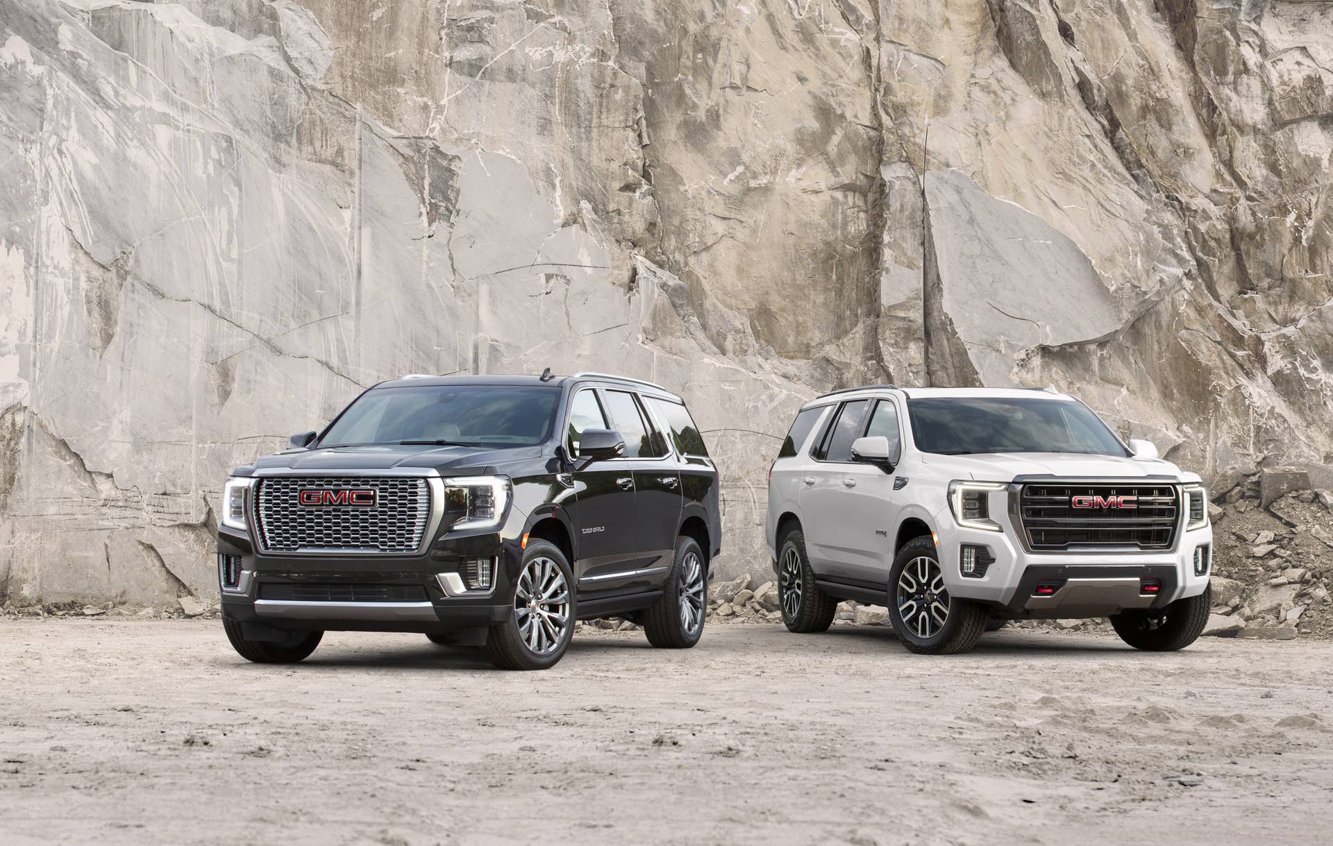 (L to R) 2021 GMC Yukon Denali and AT4