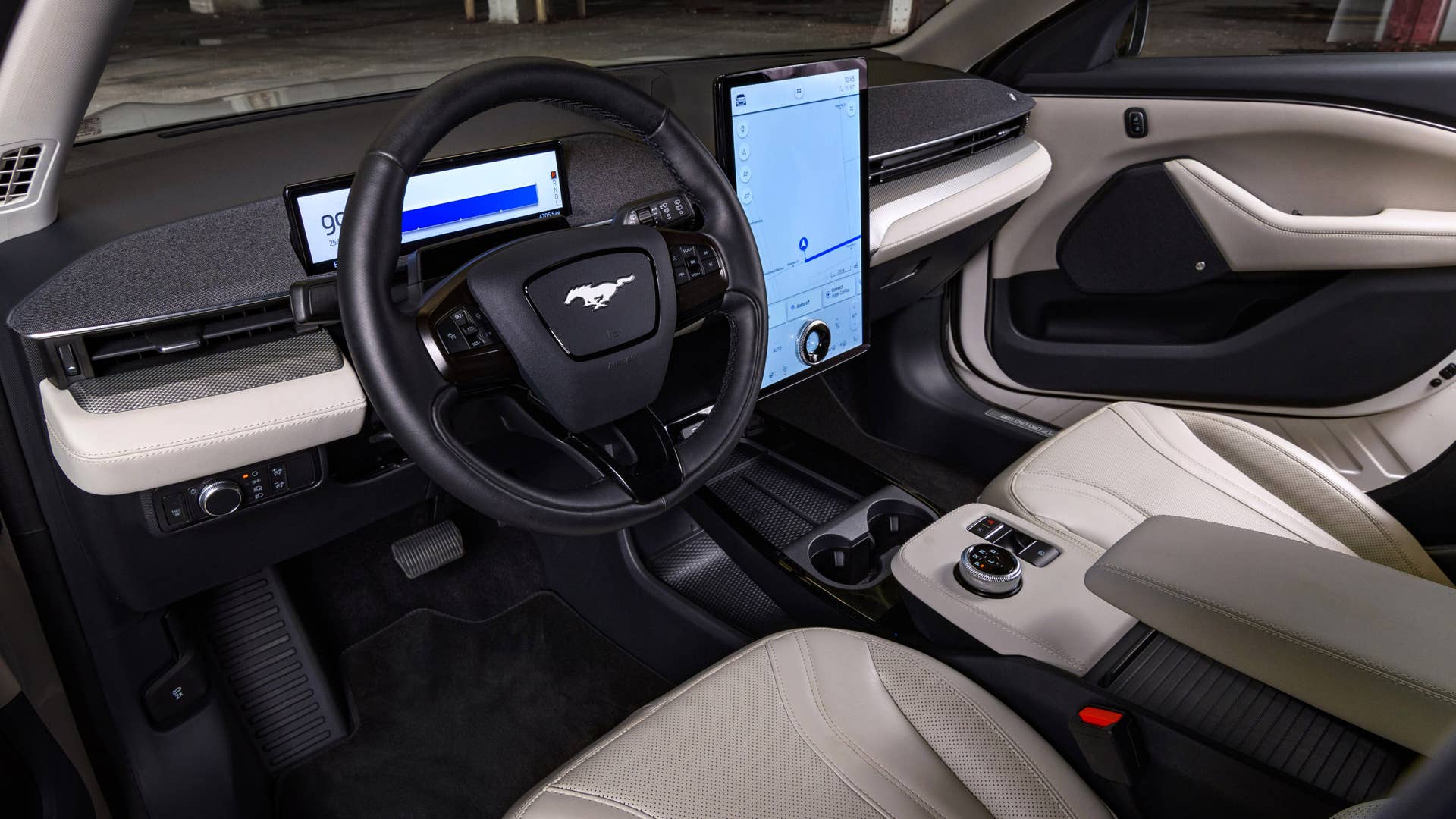 Available Ice White Appearance Package on appropriately configured 2022 Mustang Mach-E and Mustang Coupe models. Closed course.