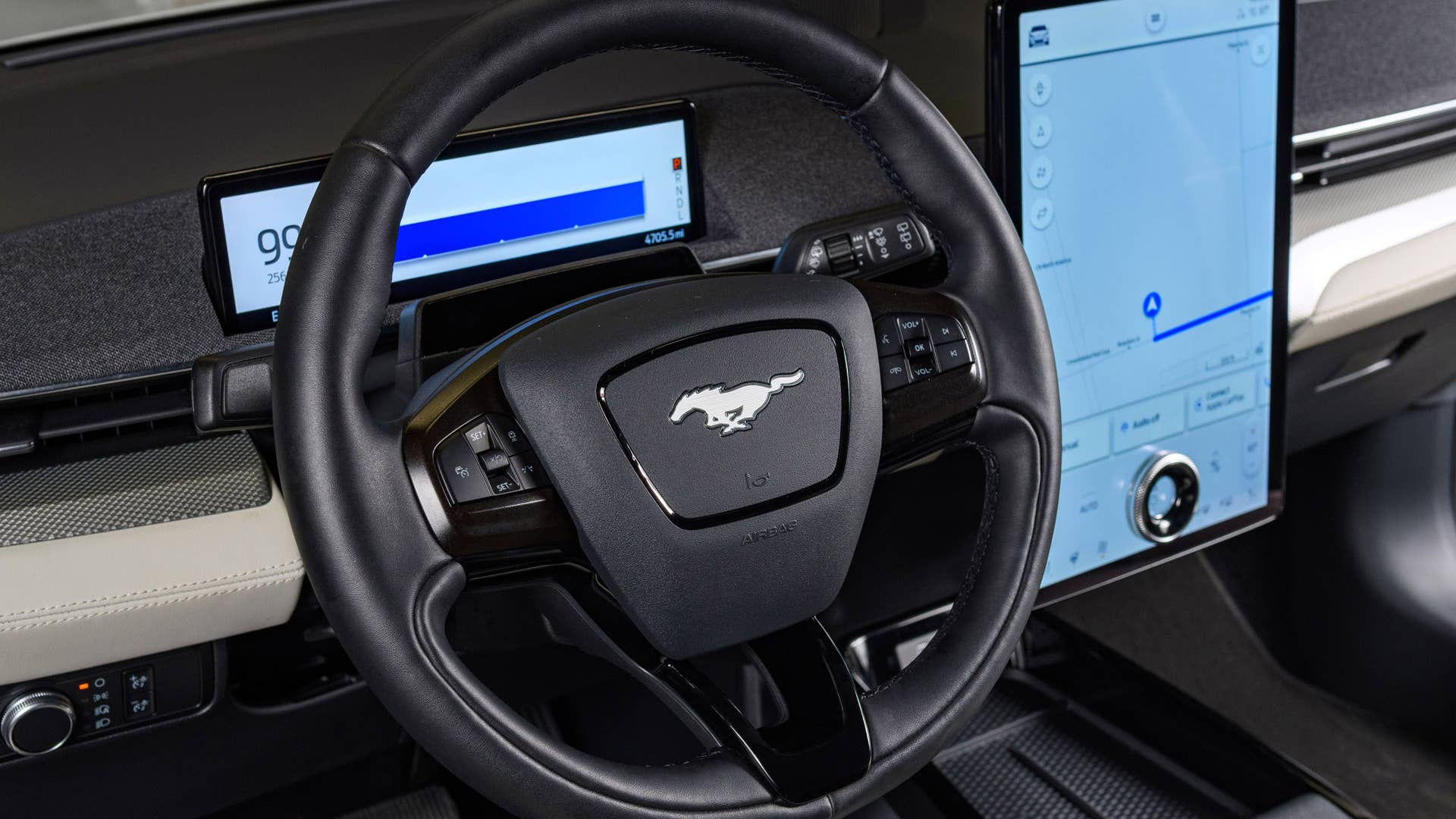 Available Ice White Appearance Package on appropriately configured 2022 Mustang Mach-E and Mustang Coupe models. Closed course.