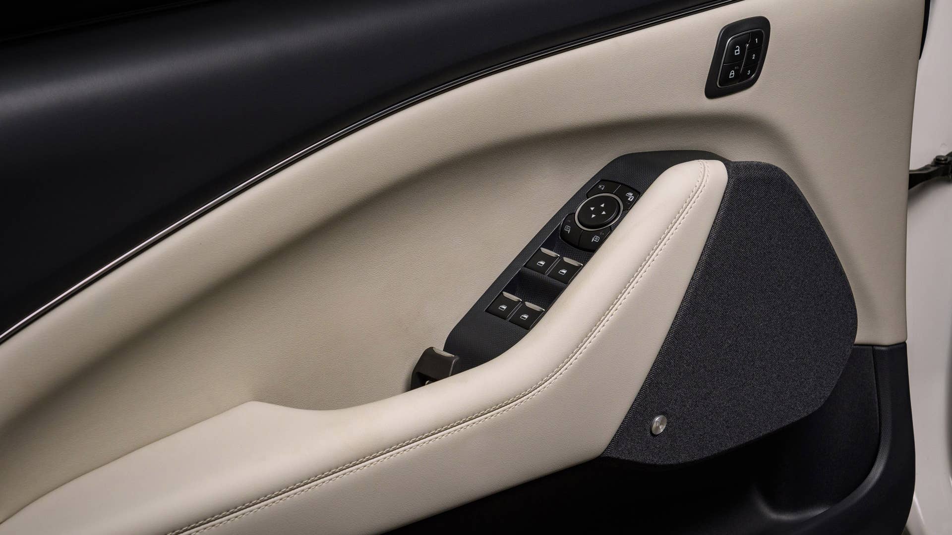 Available Ice White Appearance Package on appropriately configured 2022 Mustang Mach-E and Mustang Coupe models. Closed course. BANG & OLUFSEN© 2021 and B&O© 2021. BANG & OLUFSEN™ and B&O™ are registered trademarks of Bang & Olufsen Group. Licensed by Harman Becker Automotive Systems Manufacturing Kft. All rights reserved.