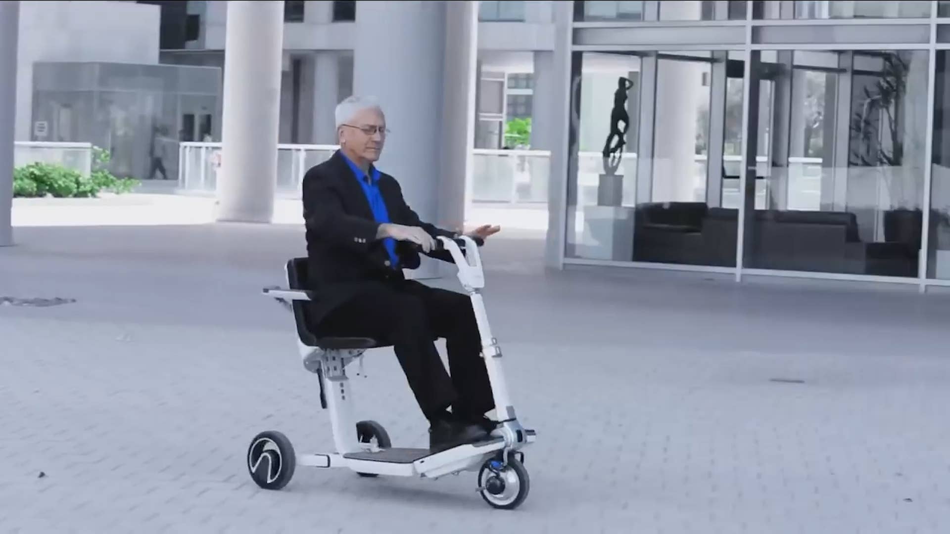 ATTO from Moving Life is a full-sized scooter with a unique foldable design. When folded the ATTO looks like a suitcase. It’s powered by a 48 Volt lithium-ion battery with 12 miles of range per charge. It has a top speed of 4 mph with the help of a brushless dc motor. To learn more click here https://amzn.to/3ec151D