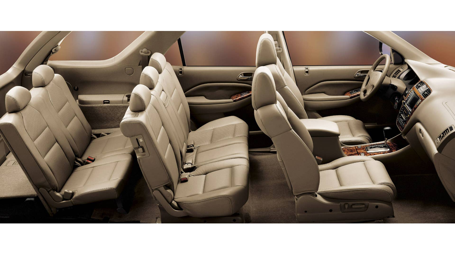 The interior of the MDX hosts a long list of standard features, and is uniquely transformable, capable of accommodating up to seven passengers.  Second- and third-row seats that split and fold flat into the floor make for an interior that can be quickly and easy reconfigured to accommodate from one to seven passengers and a wide variety of cargo, from gardening to recreation and sports equipment, including a six foot ladder.  A wide track and flat floor design further enhance the vehicle’s passenger and cargo carrying capabilities. The optional Acura Navigation System with DVD (digital versatile disc) contains mapping of the continental U.S. on a single disc and features a nationwide directory of 3.7-million points of interest, restaurants, hotels, ATMs and a number of other categories.  In addition, the system offers a unique line trace function that leaves “electronic bread crumbs” on the navigation screen for re-tracing your steps during off-road excursions in unmapped areas.