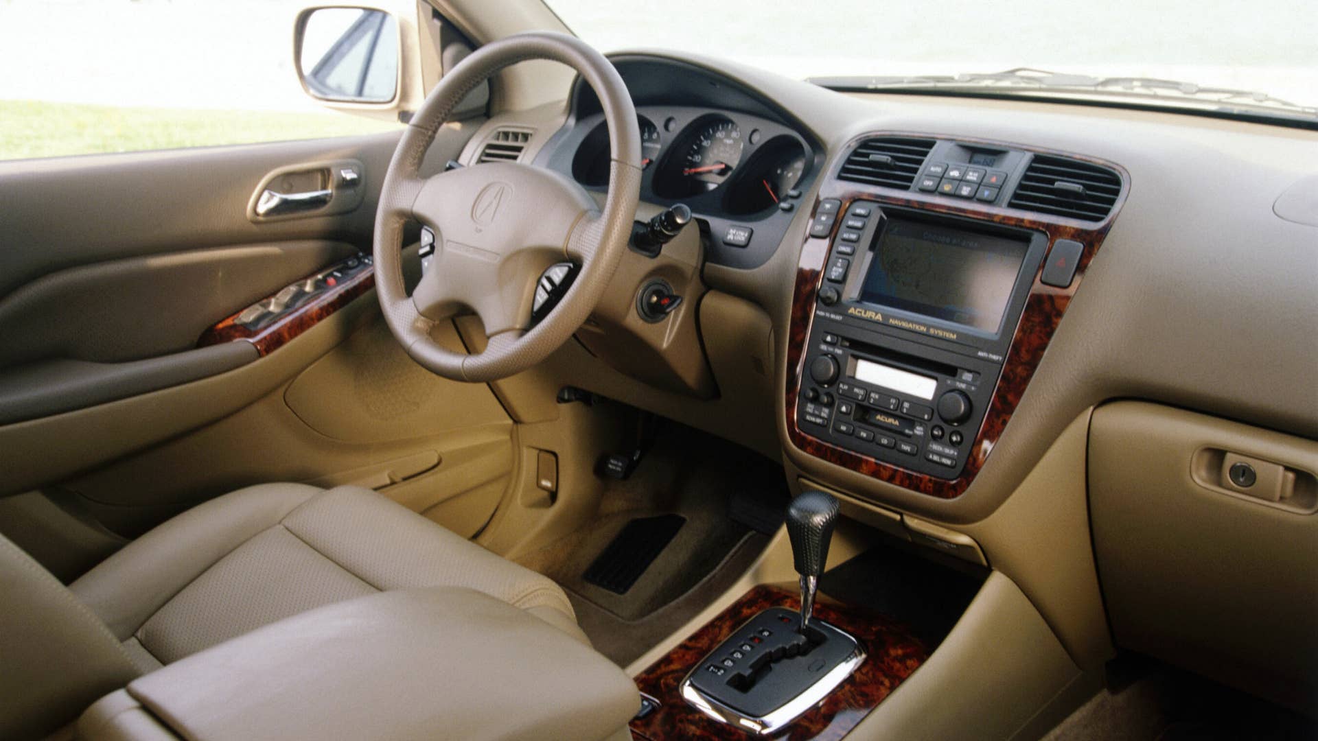 The interior of the MDX hosts a long list of standard features, and is uniquely transformable, capable of accommodating up to seven passengers.  Second- and third-row seats that split and fold flat into the floor make for an interior that can be quickly and easy reconfigured to accommodate from one to seven passengers and a wide variety of cargo, from gardening to recreation and sports equipment, including a six foot ladder.  A wide track and flat floor design further enhance the vehicle’s passenger and cargo carrying capabilities. The optional Acura Navigation System with DVD (digital versatile disc) contains mapping of the continental U.S. on a single disc and features a nationwide directory of 3.7-million points of interest, restaurants, hotels, ATMs and a number of other categories.  In addition, the system offers a unique line trace function that leaves “electronic bread crumbs” on the navigation screen for re-tracing your steps during off-road excursions in unmapped areas.