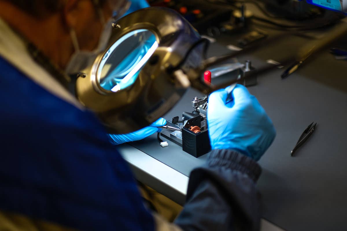 Workers prepare to build ventilators at the GM manufacturing facility in Kokomo, Indiana, Monday, April 6, 2020, where GM and Ventec Life Systems are partnering to produce Ventec critical care ventilators in response to the COVID-19 pandemic. (Photo by AJ Mast for General Motors)
