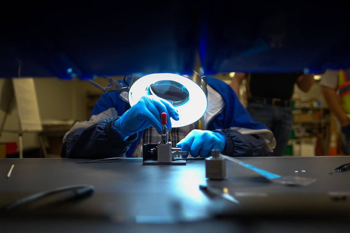 Workers prepare to build ventilators at the GM manufacturing facility in Kokomo, Indiana, Monday, April 6, 2020, where GM and Ventec Life Systems are partnering to produce Ventec critical care ventilators in response to the COVID-19 pandemic. (Photo by AJ Mast for General Motors)