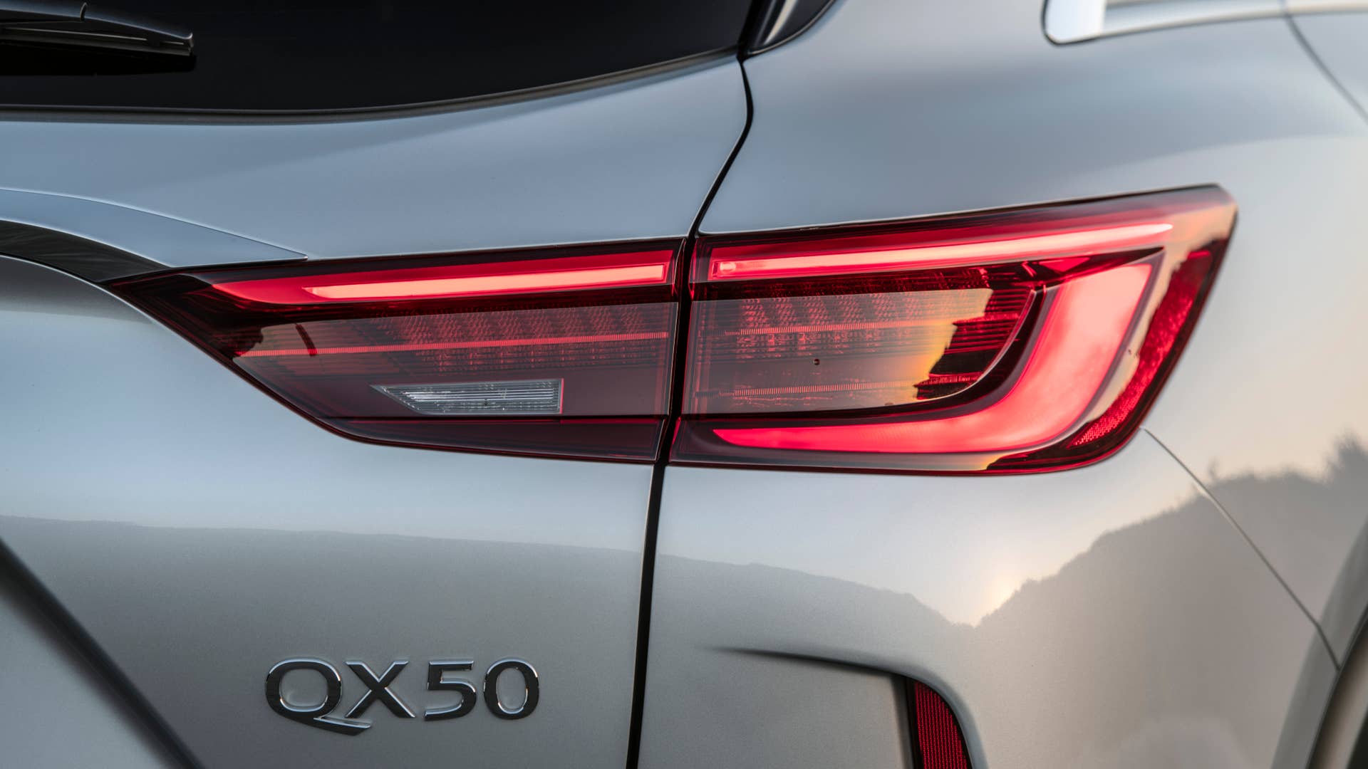 The INFINITI QX50 is defined by its distinctive proportions, which set the car apart from its competitors. For 2021, enhancements to the QX50 include a new Mineral Black exterior color option.