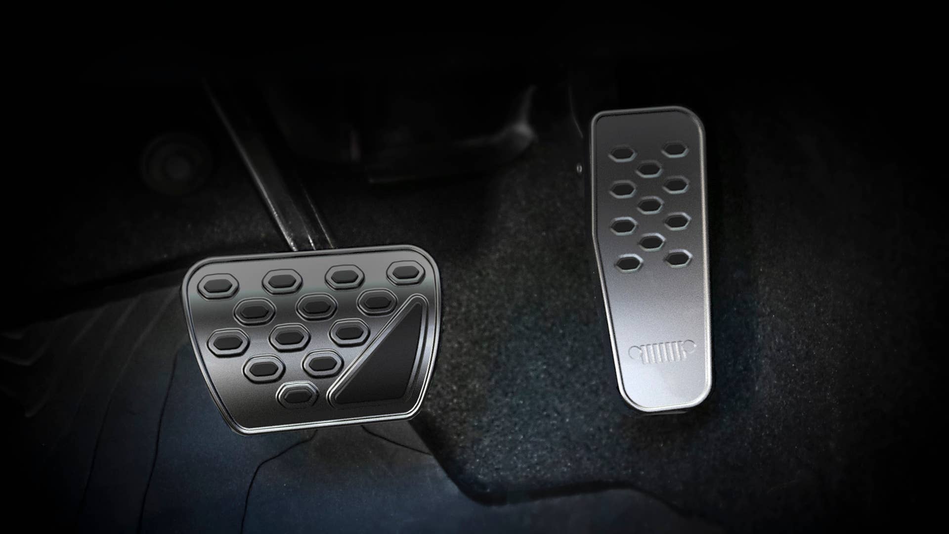 Inside the Jeep Top Dog Concept, Mopar stainless-steel pedal covers with black rubber pads add a bold flare and plenty of traction to the accelerator and brake pedals.