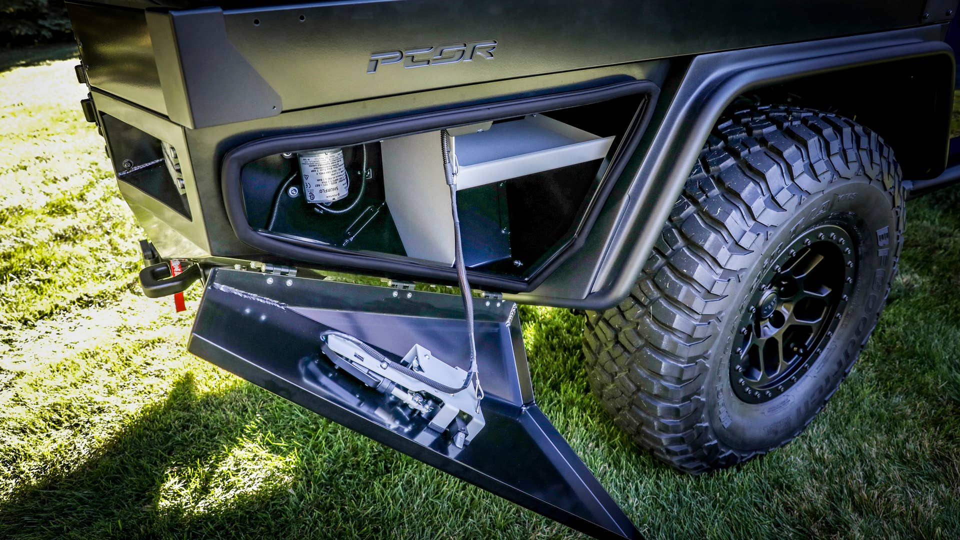 On the passenger-side of the Jeep Top Dog Concept, the PCOR storage system features plenty of storage options.